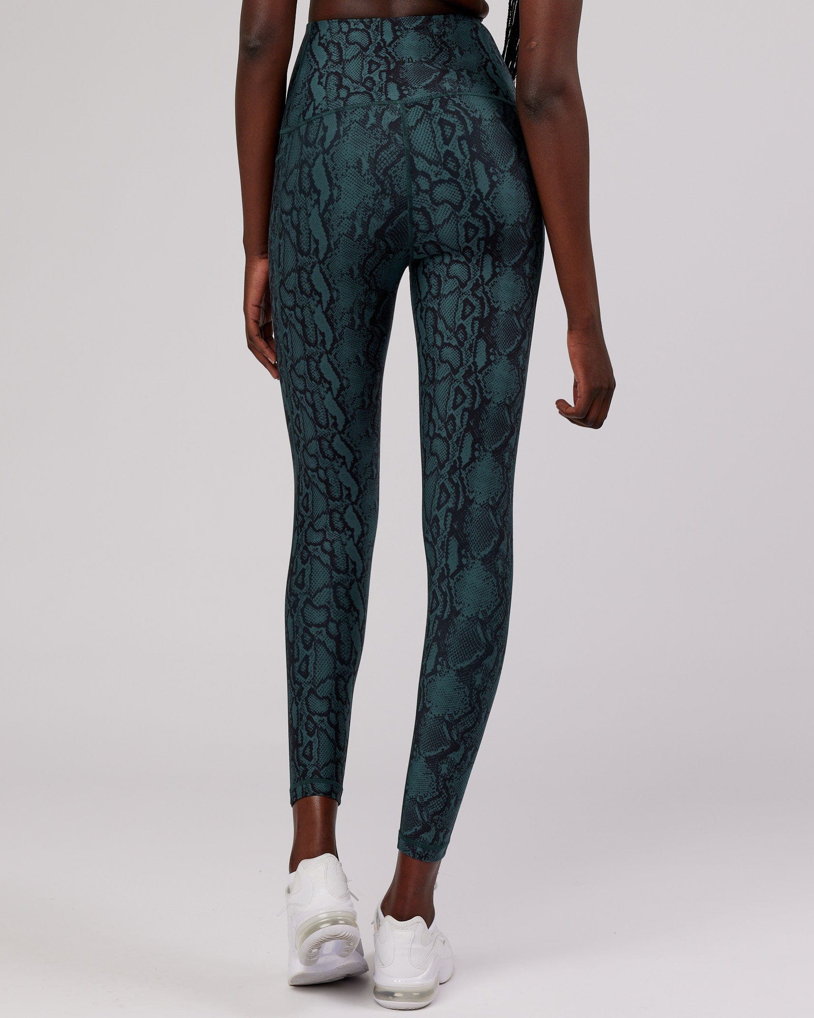 Model wearing Flux Full Length Tight - Forest Snakeskin