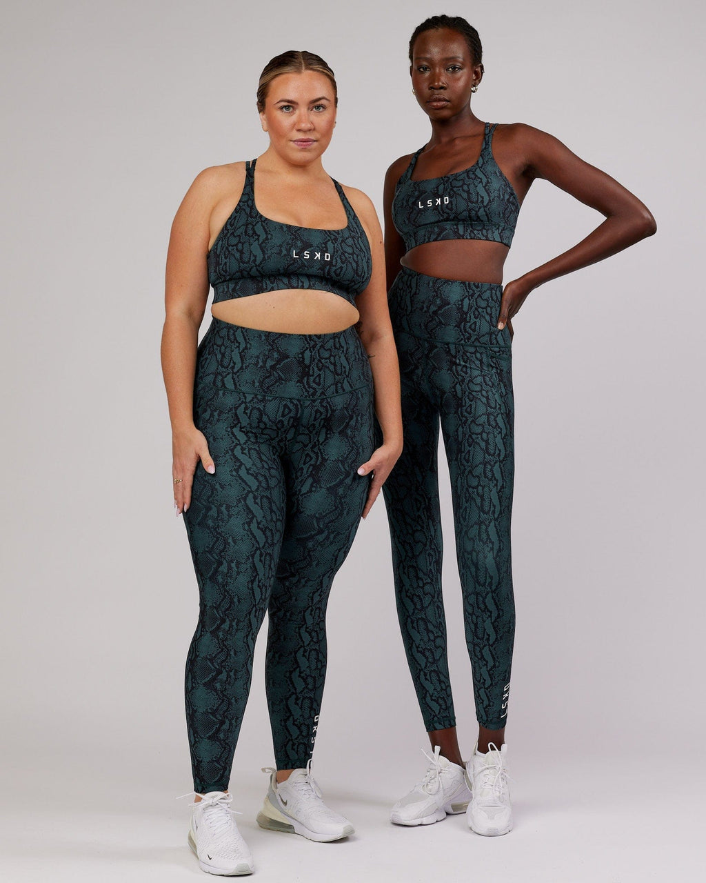 Model wearing Flux Full Length Tight - Forest Snakeskin