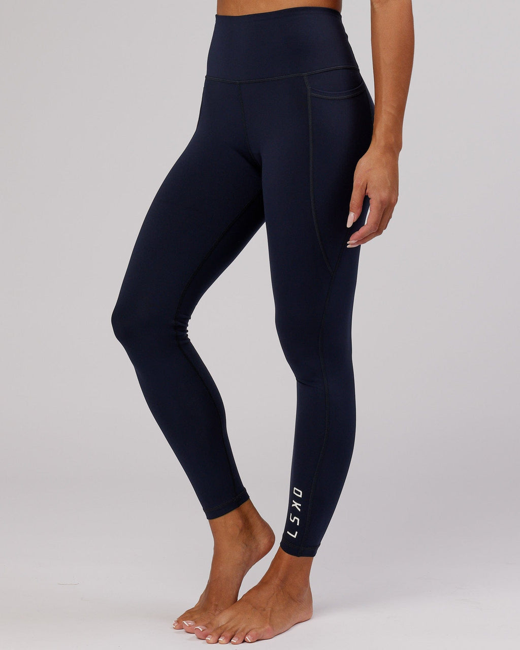 Model wearing Flux Full Length Tight - Navy