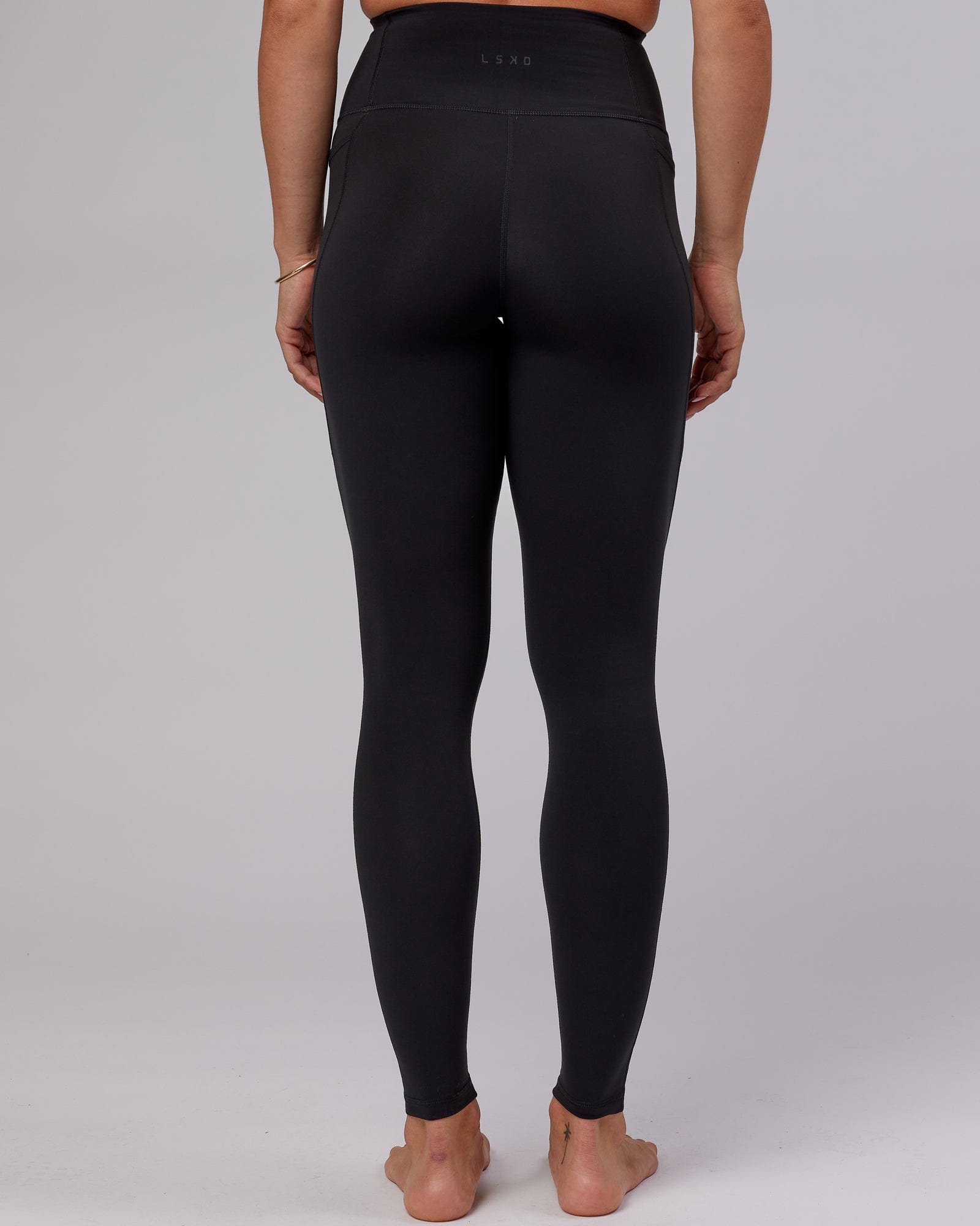 Model wearing Flux X-Long Tight - Black