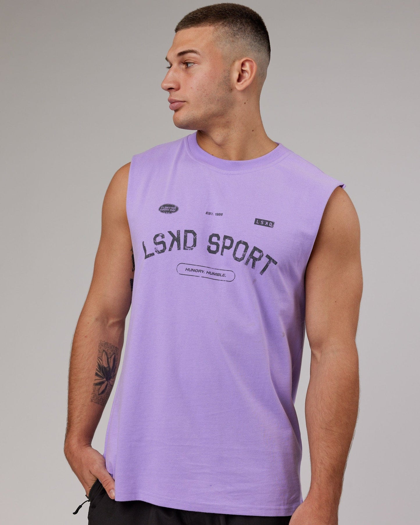 Model wearing Free Throw Heavyweight Tank Oversize - Peak Purple