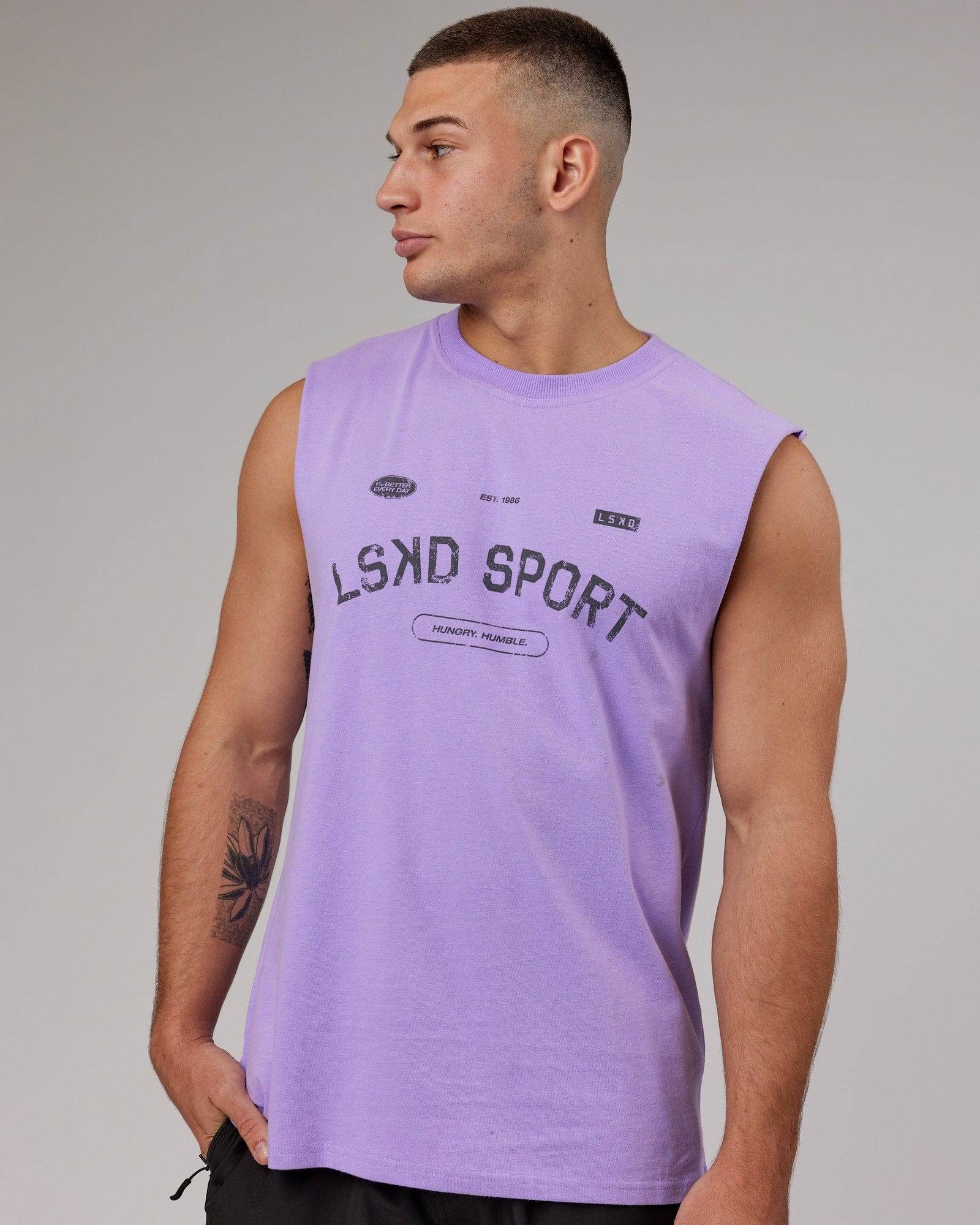 Model wearing Free Throw Heavyweight Tank Oversize - Peak Purple