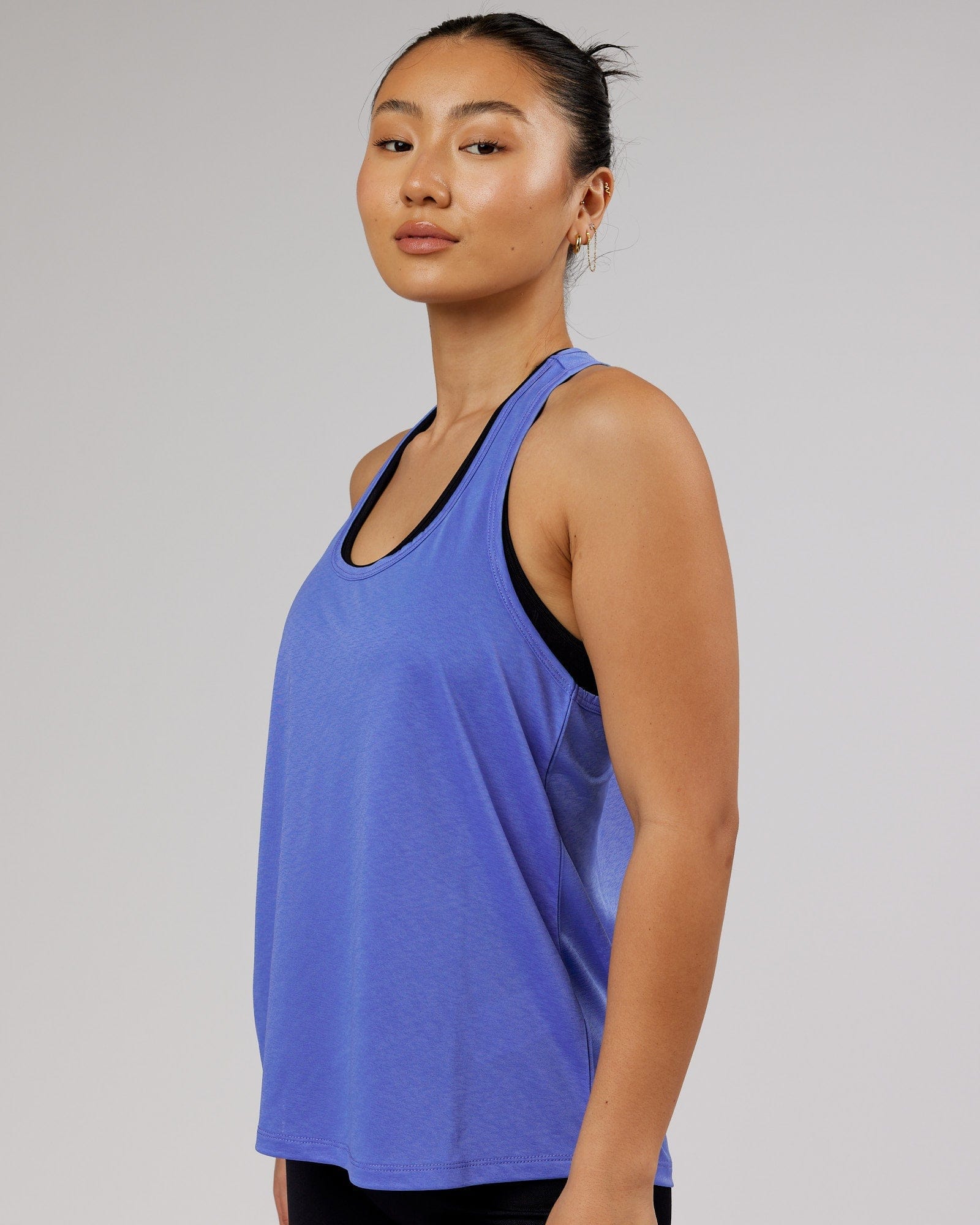 Model wearing Free Throw Tank - Cornflower Blue