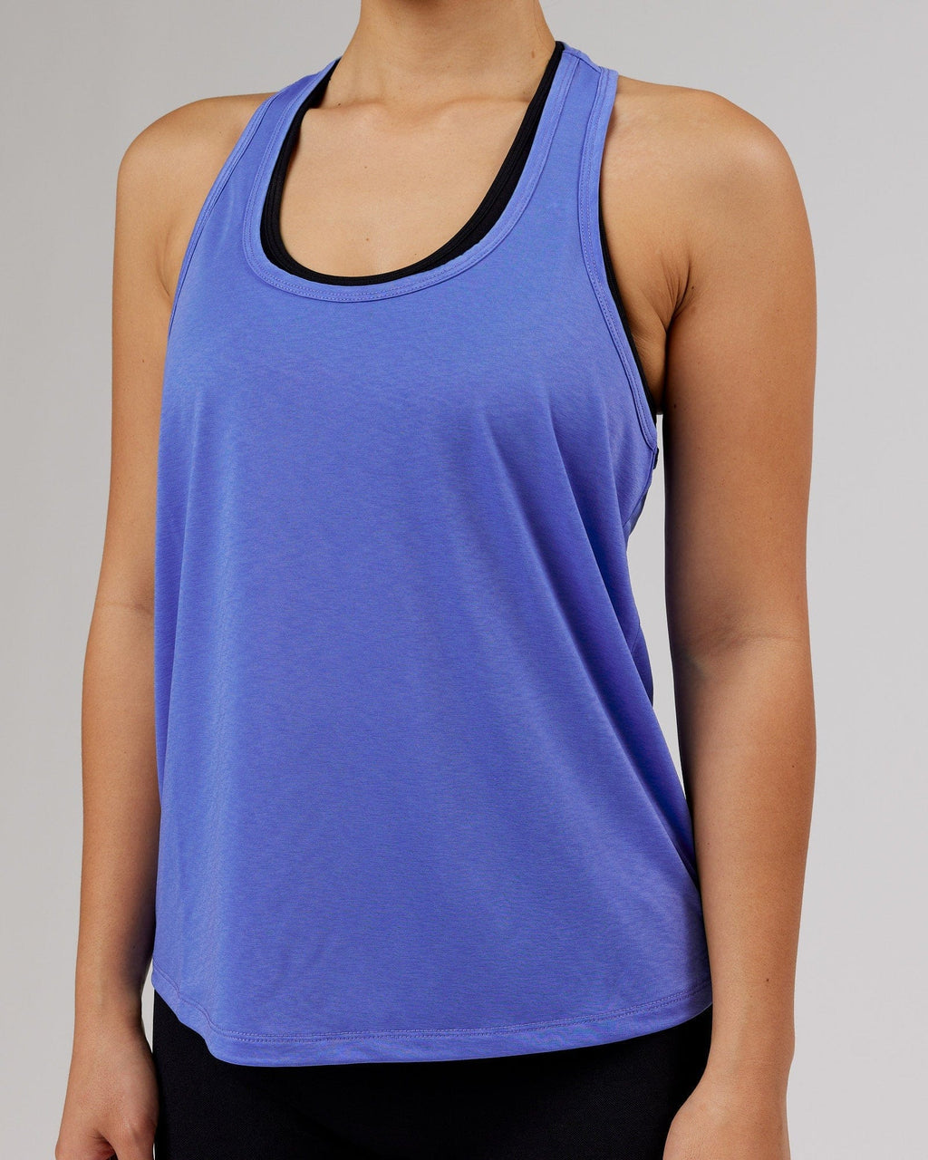 Model wearing Free Throw Tank - Cornflower Blue