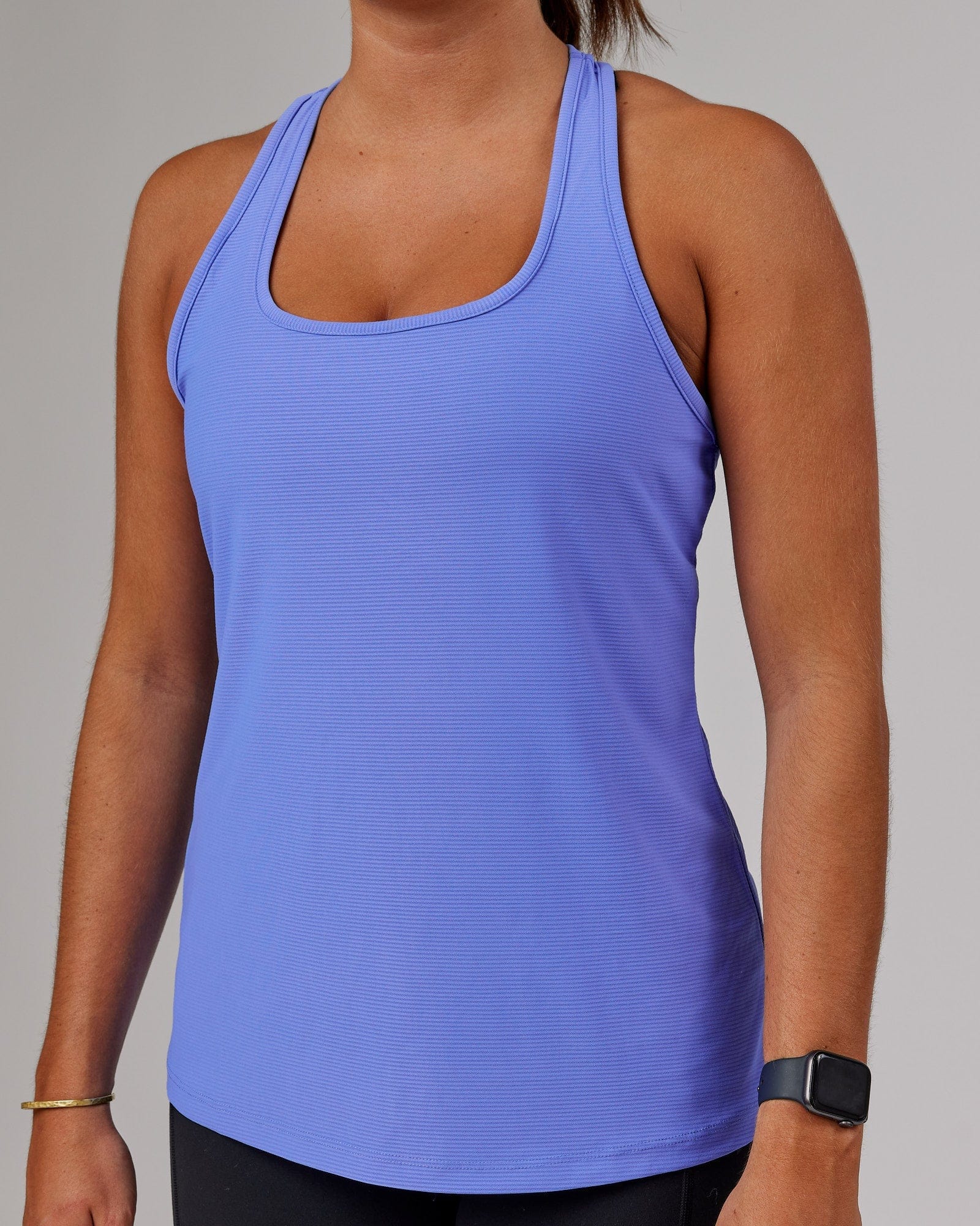 Model wearing Freedom Performance Tank - Cornflower Blue