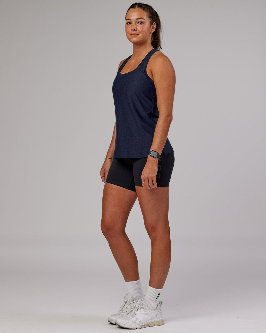 Model wearing Freedom Performance Tank - Navy