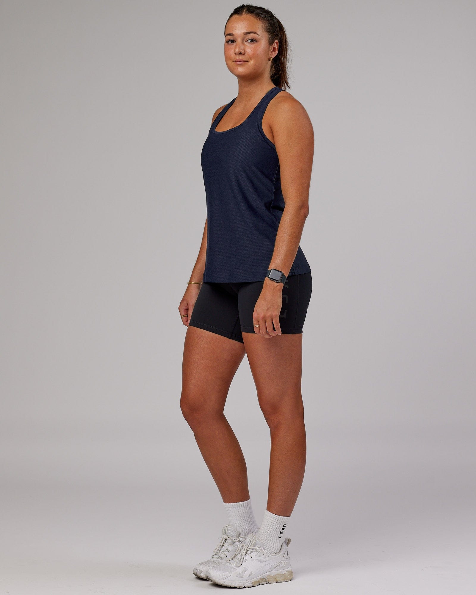 Model wearing Freedom Performance Tank - Navy