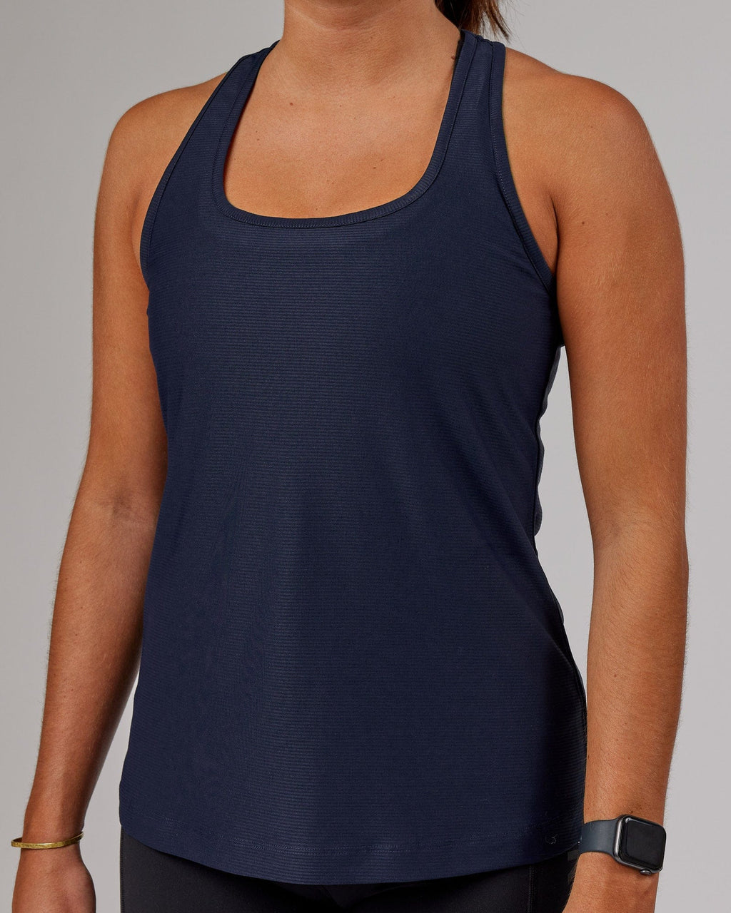 Model wearing Freedom Performance Tank - Navy