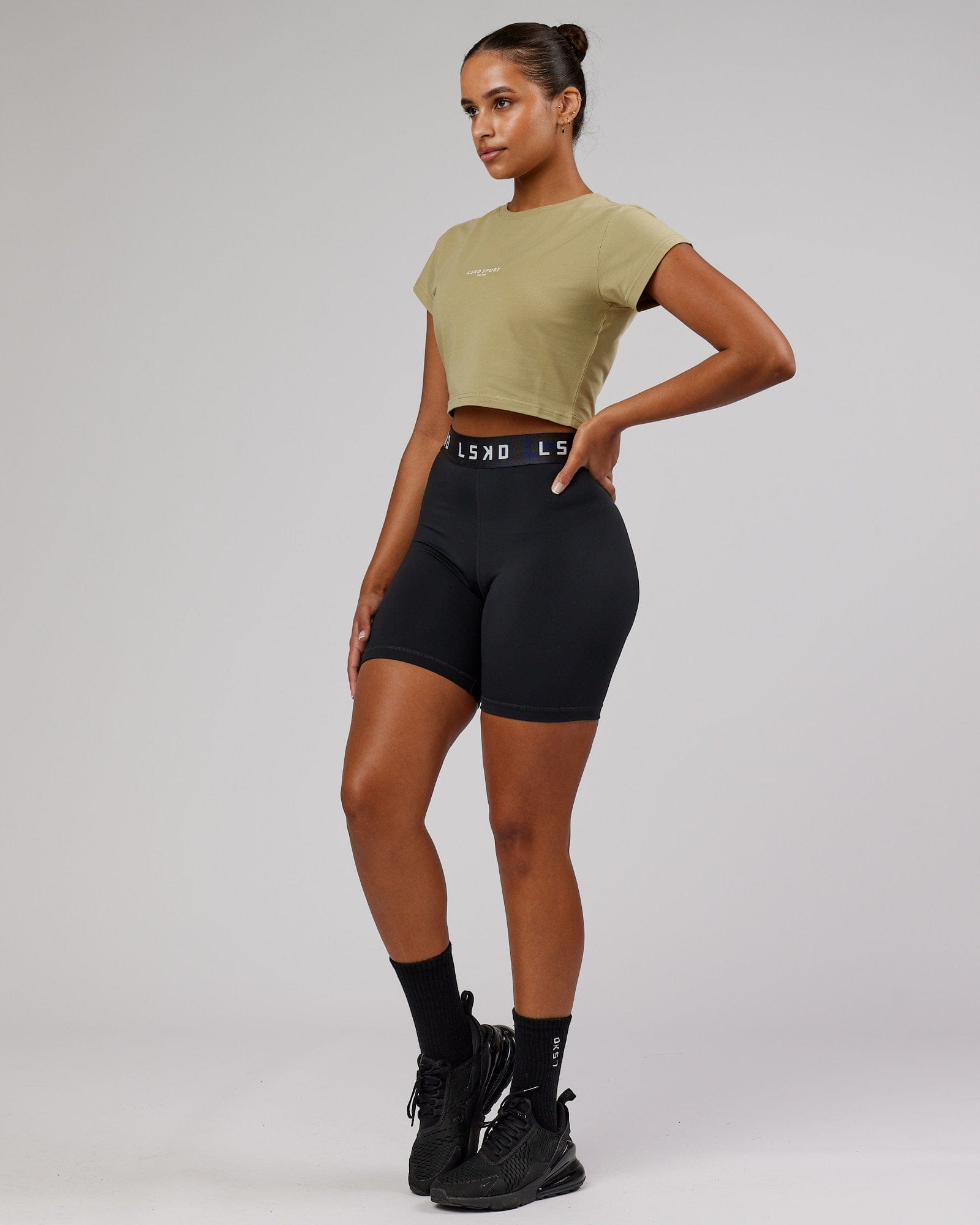 Model wearing Front Runner Baby Tee - Reed