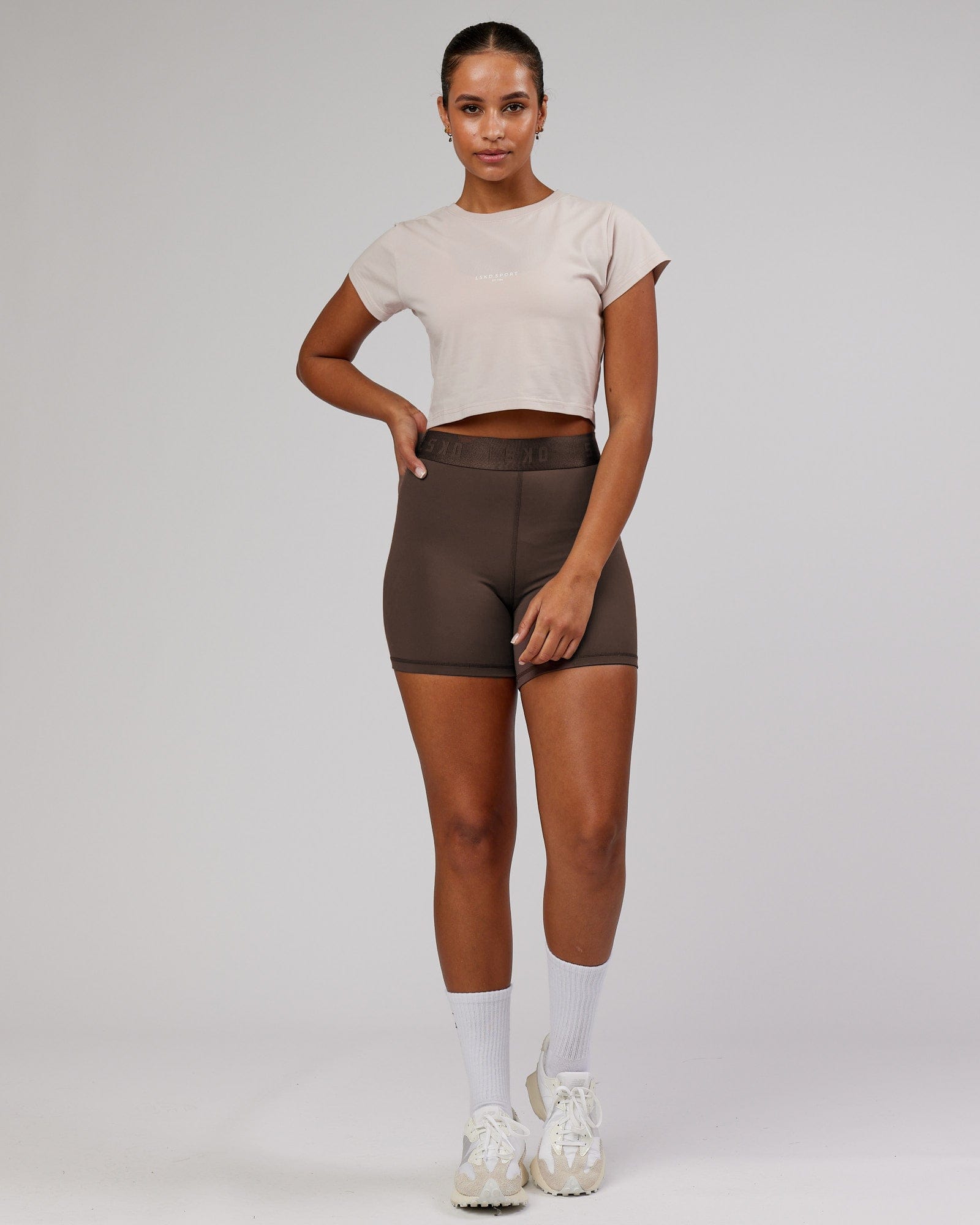 Model wearing Front Runner Baby Tee - Silver Grey