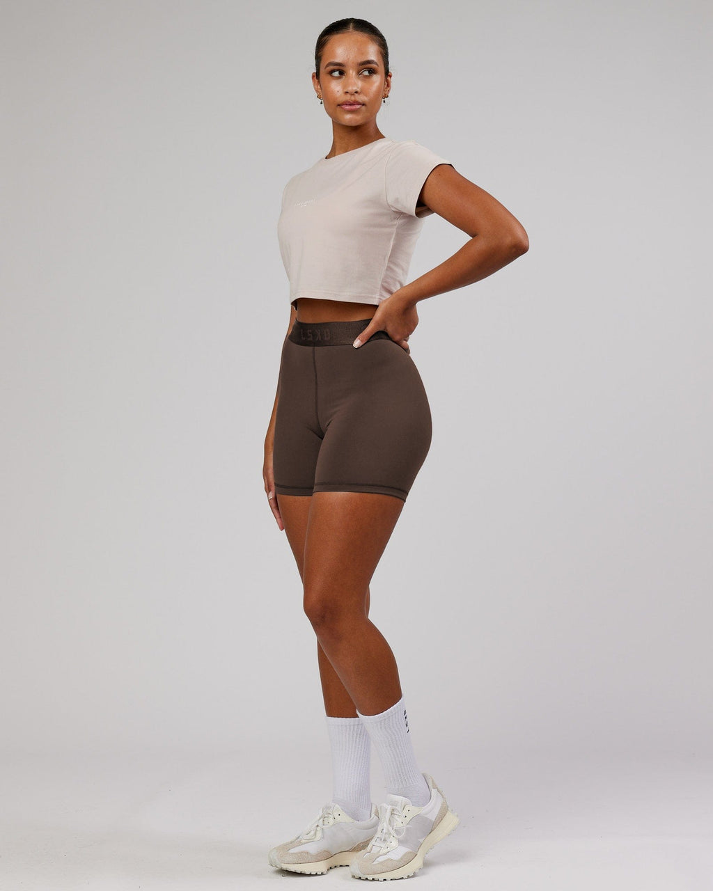 Model wearing Front Runner Baby Tee - Silver Grey