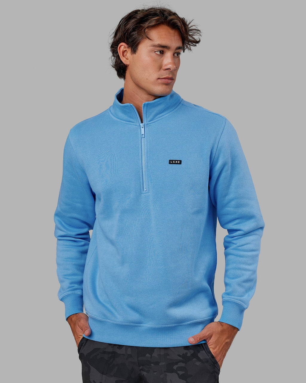 Model wearing Fundamental 1/4 Zip Sweater - Azure Blue