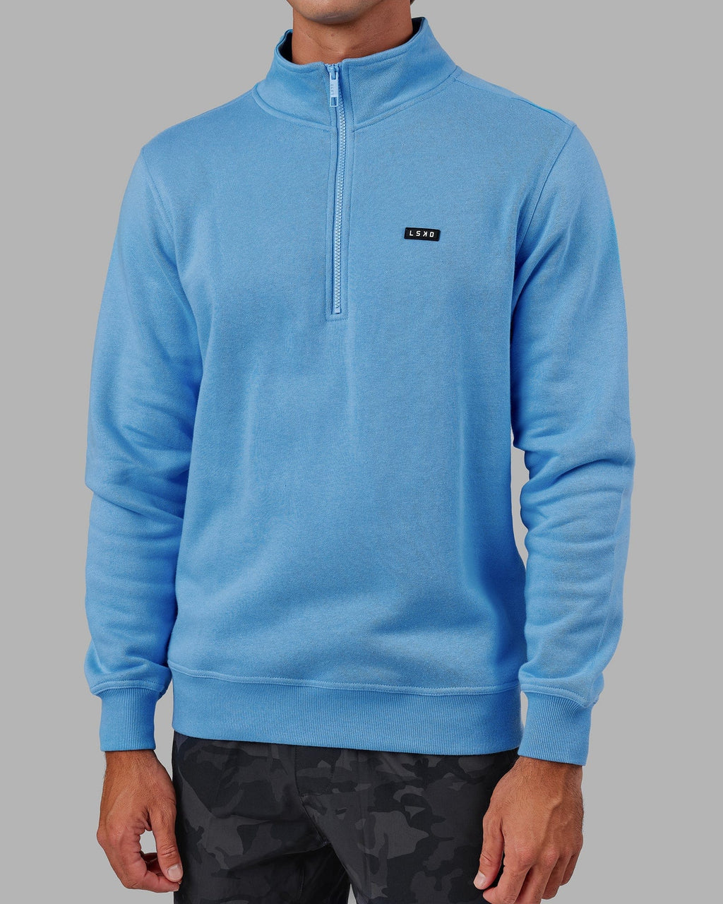 Model wearing Fundamental 1/4 Zip Sweater - Azure Blue