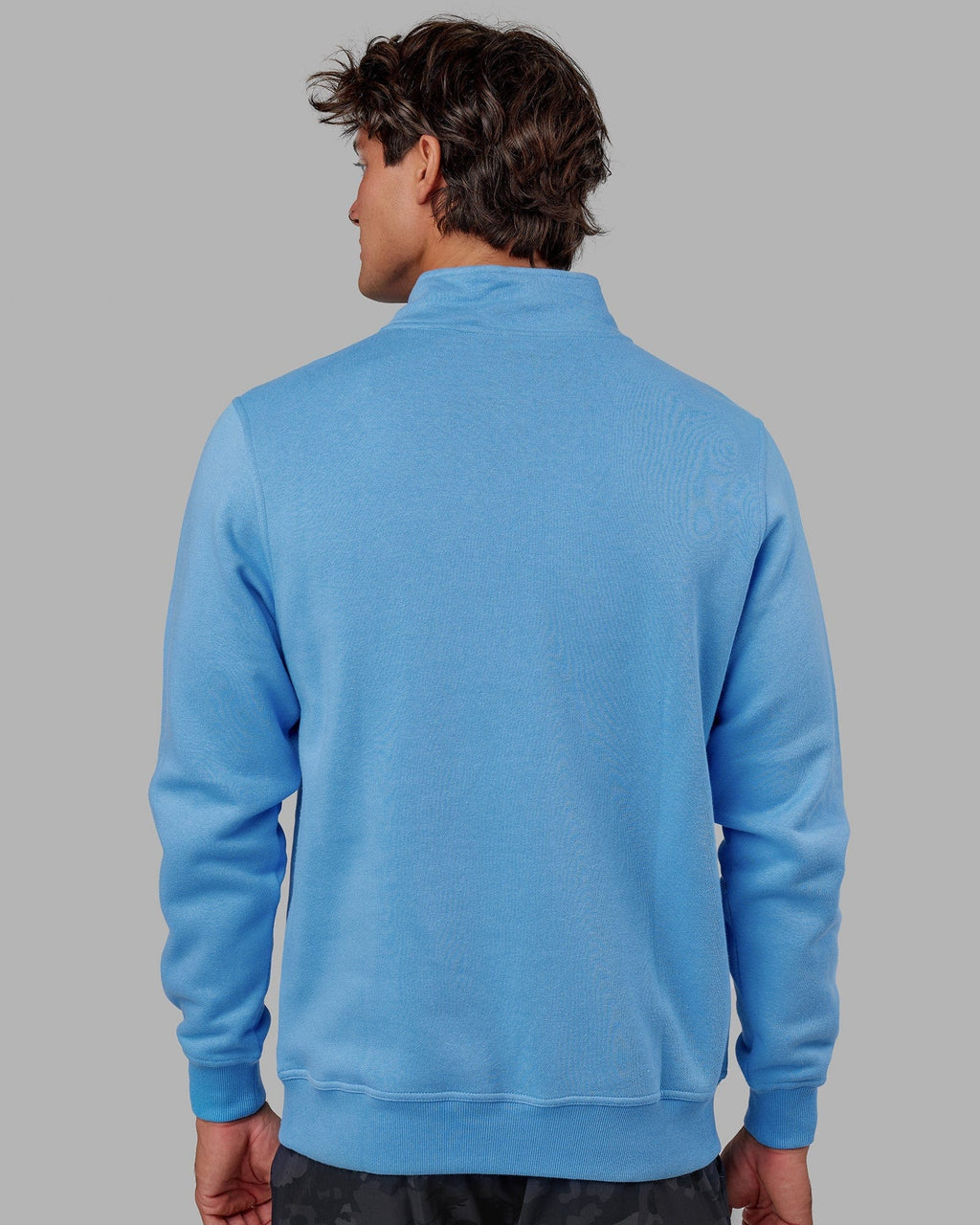 Model wearing Fundamental 1/4 Zip Sweater - Azure Blue