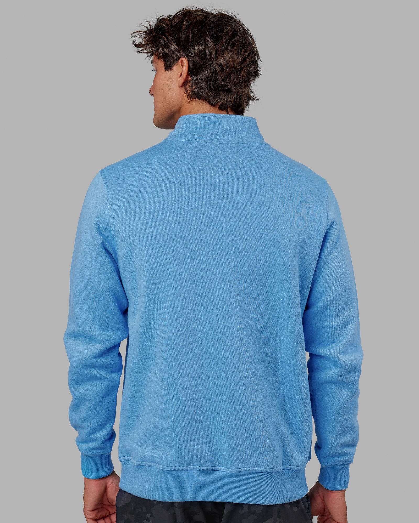 Model wearing Fundamental 1/4 Zip Sweater - Azure Blue