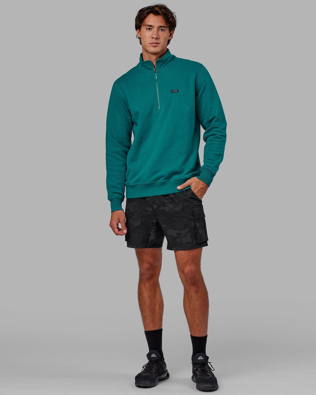 Model wearing Fundamental 1/4 Zip Sweater - Deep Lake