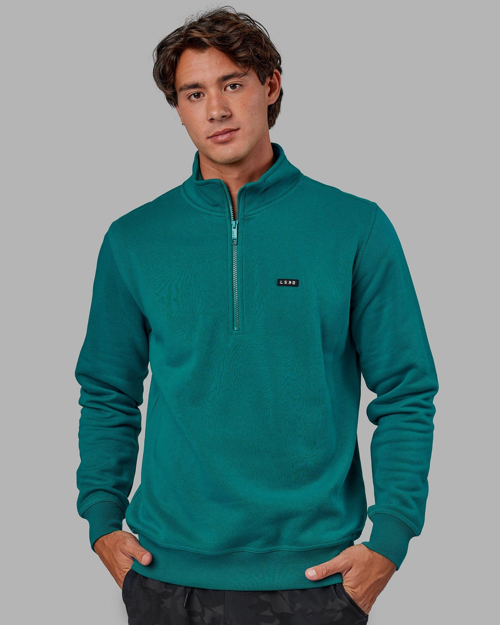 Model wearing Fundamental 1/4 Zip Sweater - Deep Lake