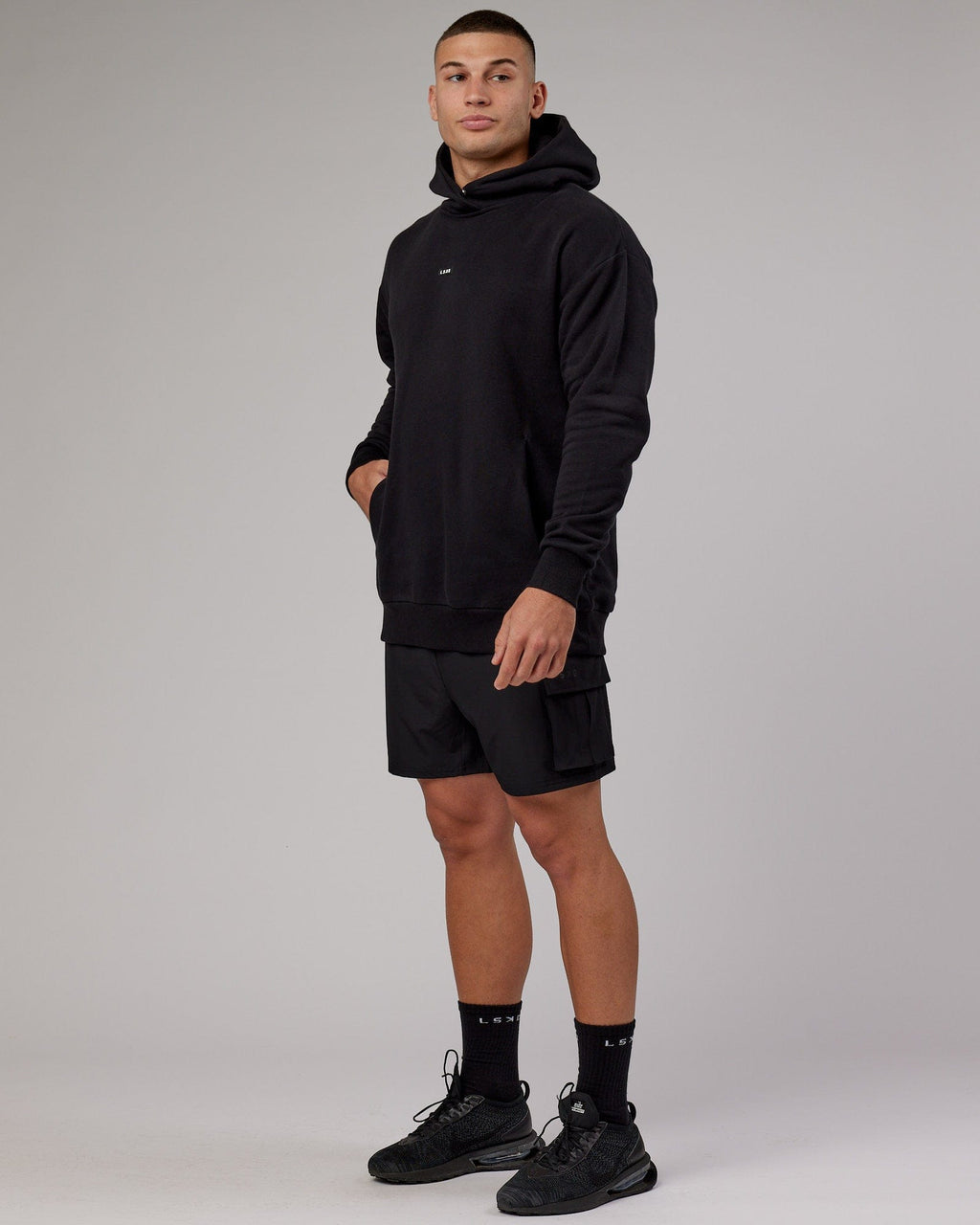 Model wearing Fundamental Hoodie Oversize - Black