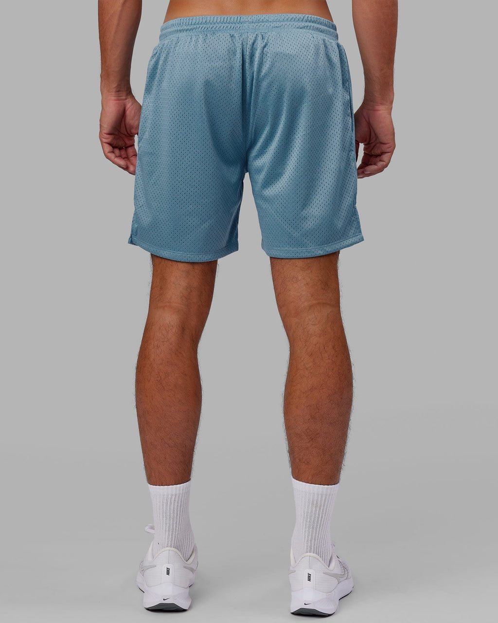 Model wearing Fundamental Mesh Short - Azure Blue