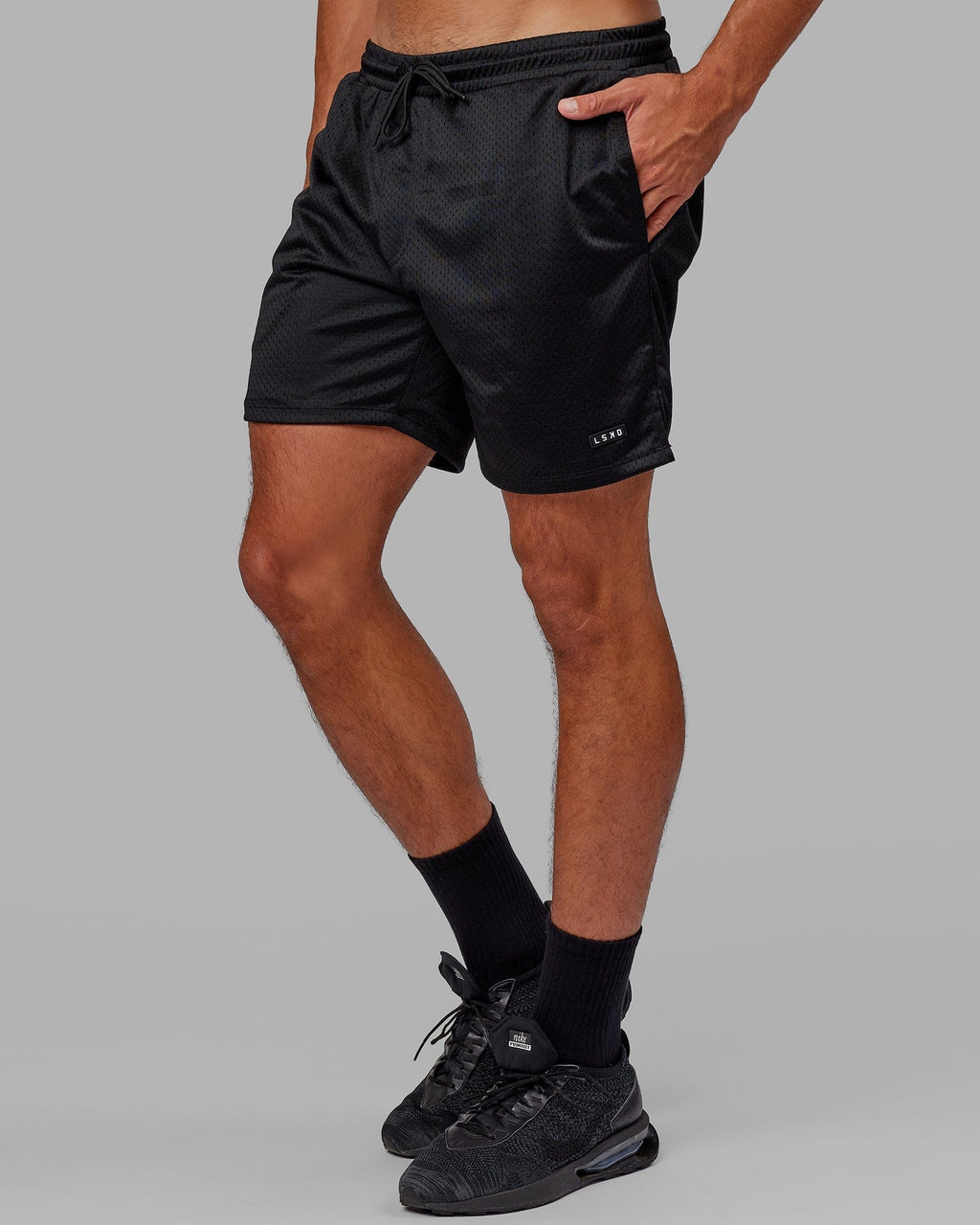 Model wearing Fundamental Mesh Short - Black