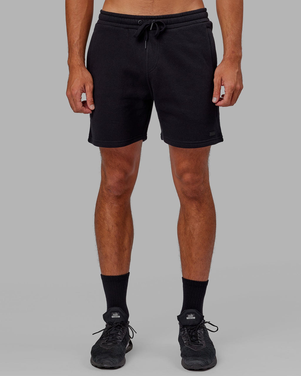 Model wearing Fundamental Track Short - Black-Black