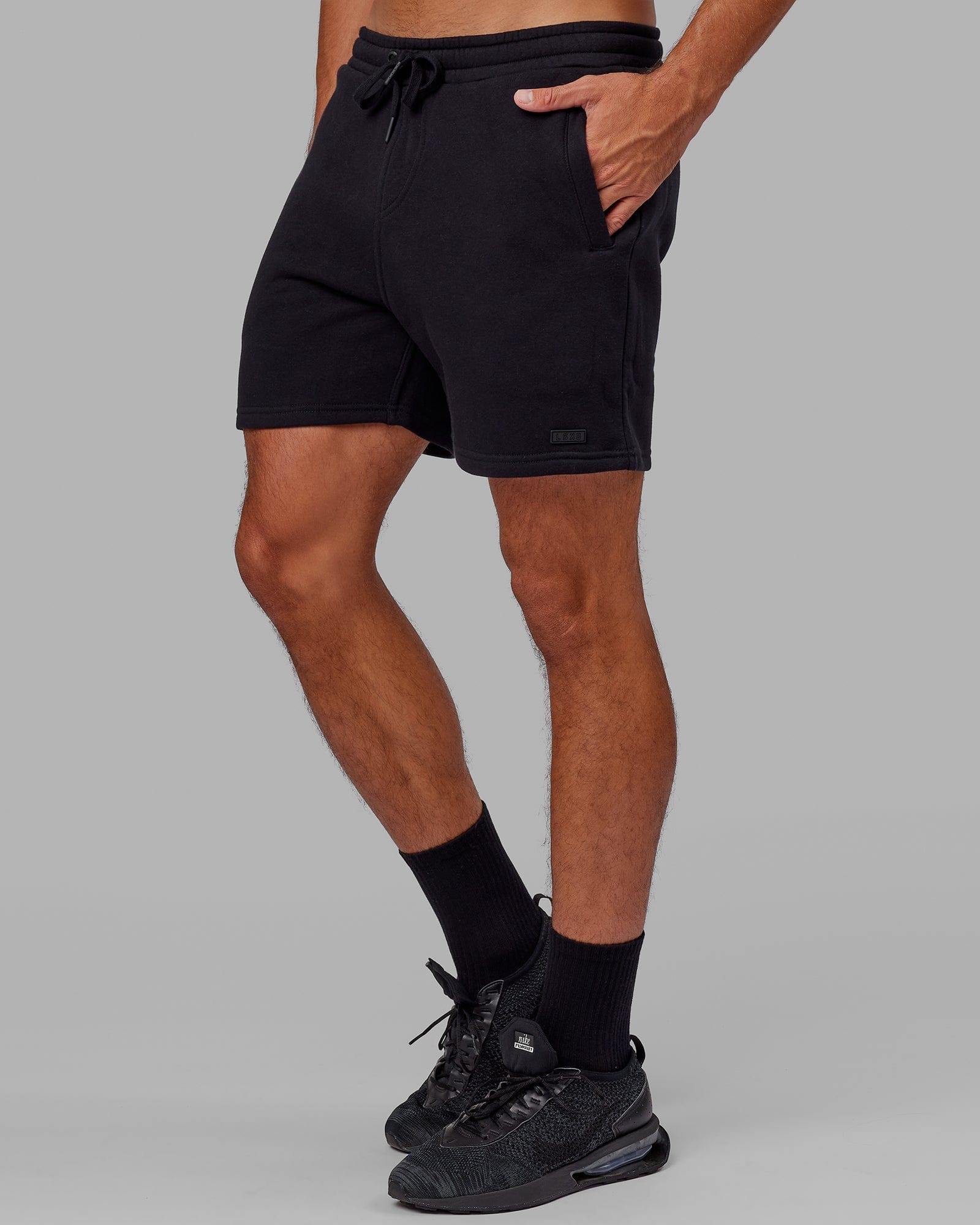 Model wearing Fundamental Track Short - Black-Black