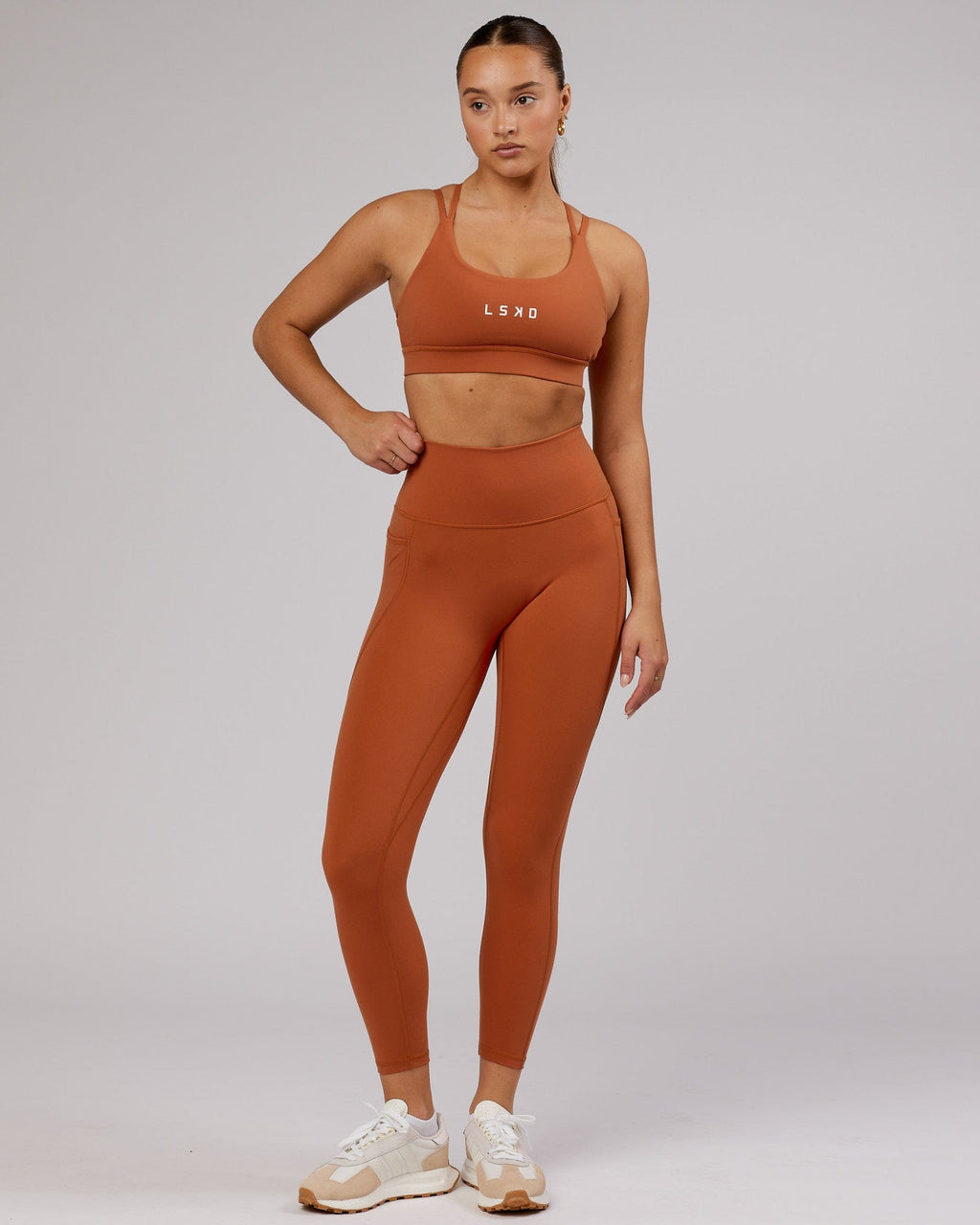 Model wearing Fusion 7/8 Length Tight - Auburn