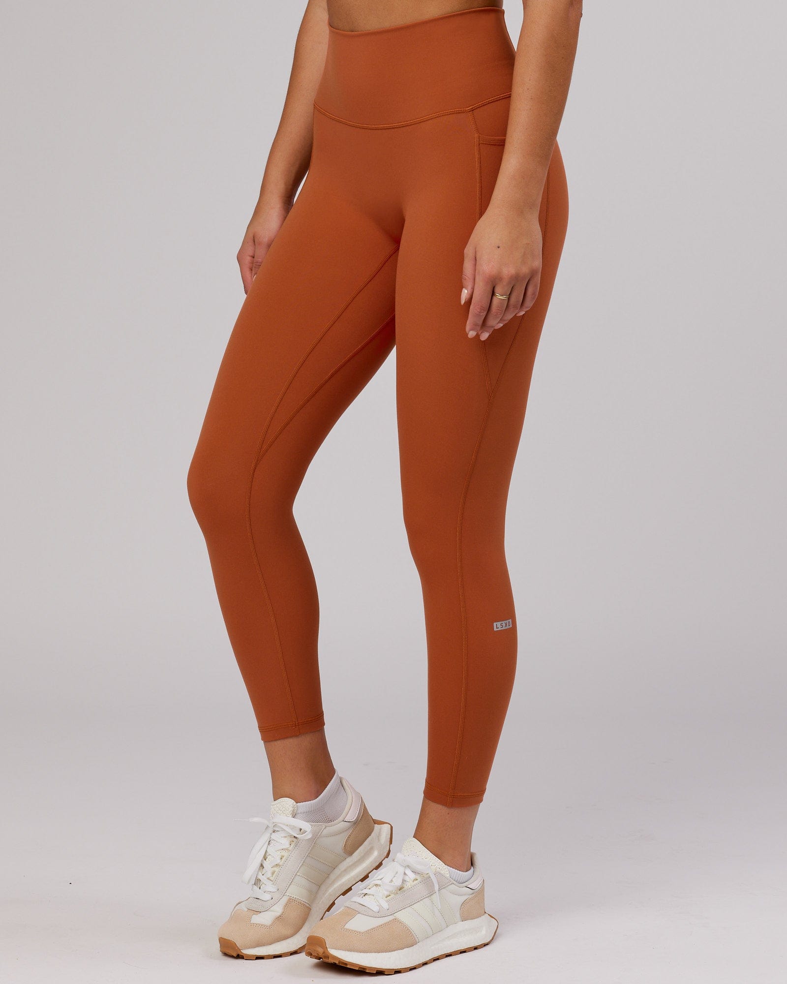 Model wearing Fusion 7/8 Length Tight - Auburn