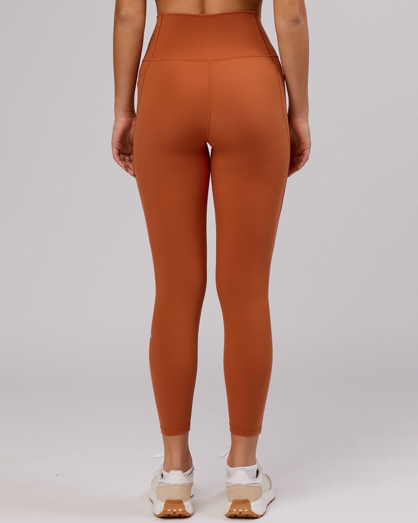 Model wearing Fusion 7/8 Length Tight - Auburn