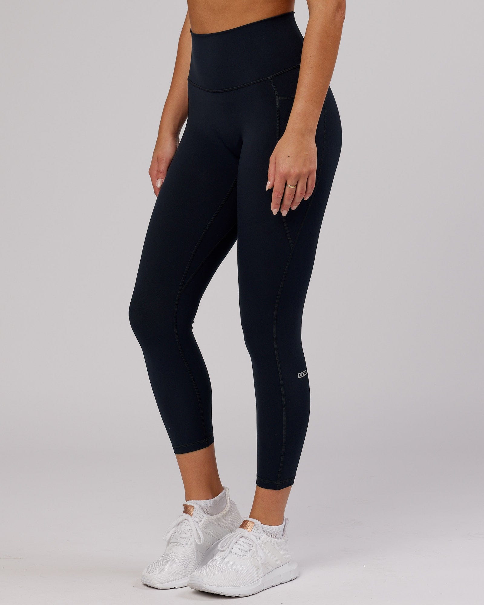 Model wearing Fusion 7/8 Length Tight - Navy