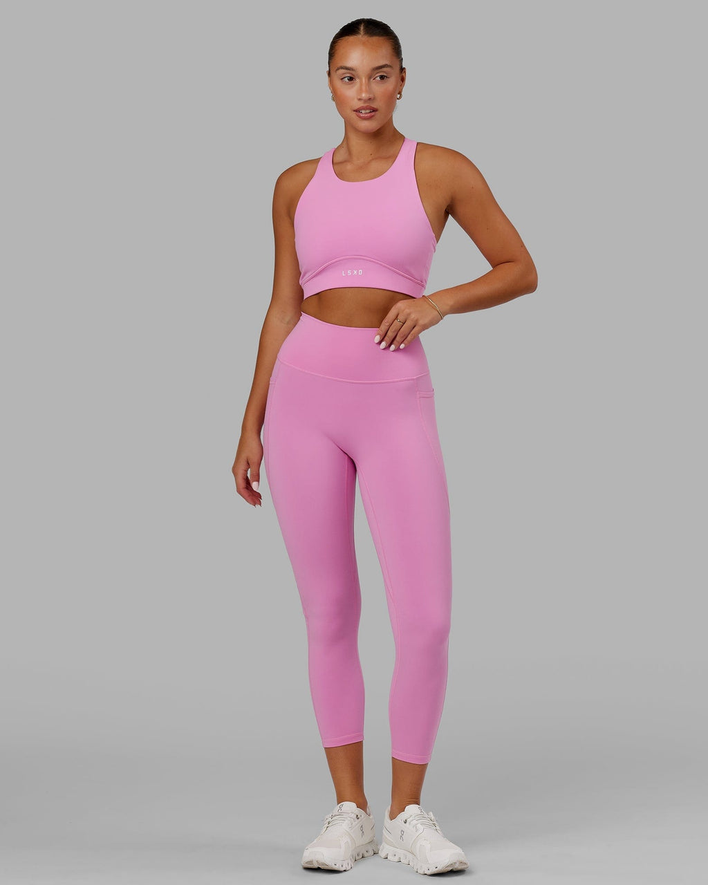 Model wearing Fusion 7/8 Length Tight - Spark Pink