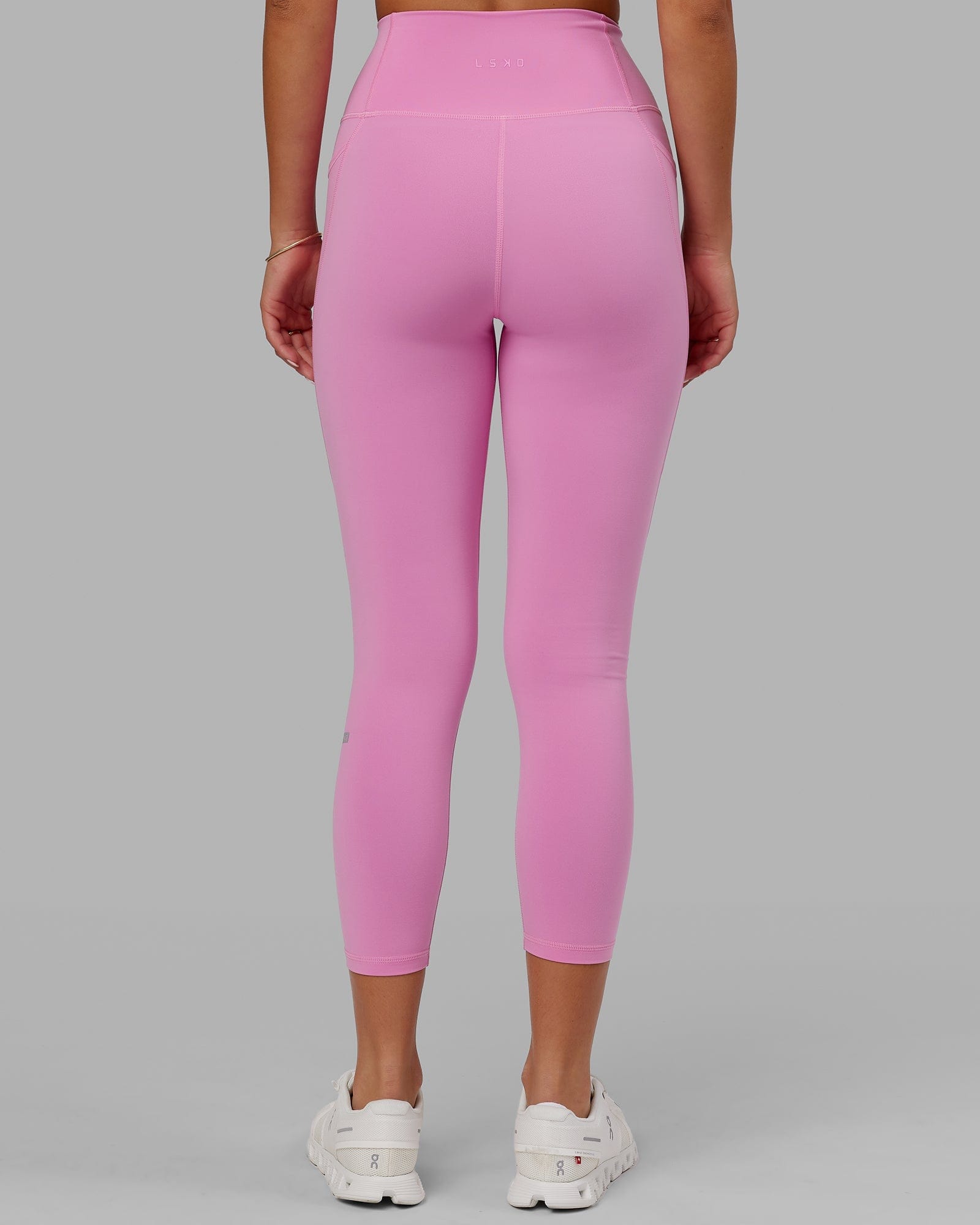 Model wearing Fusion 7/8 Length Tight - Spark Pink