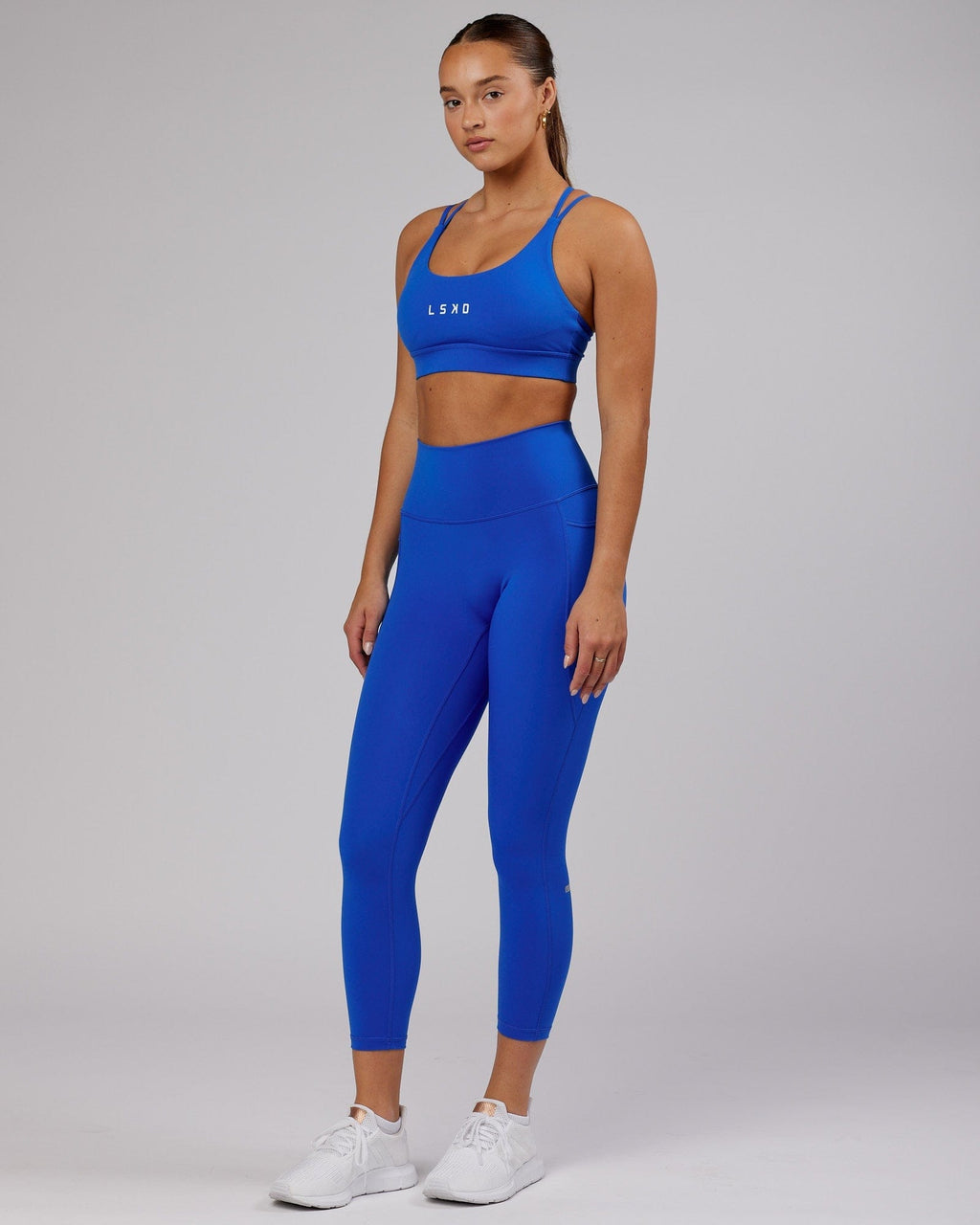 Model wearing Fusion 7/8 Length Tight - Strong Blue