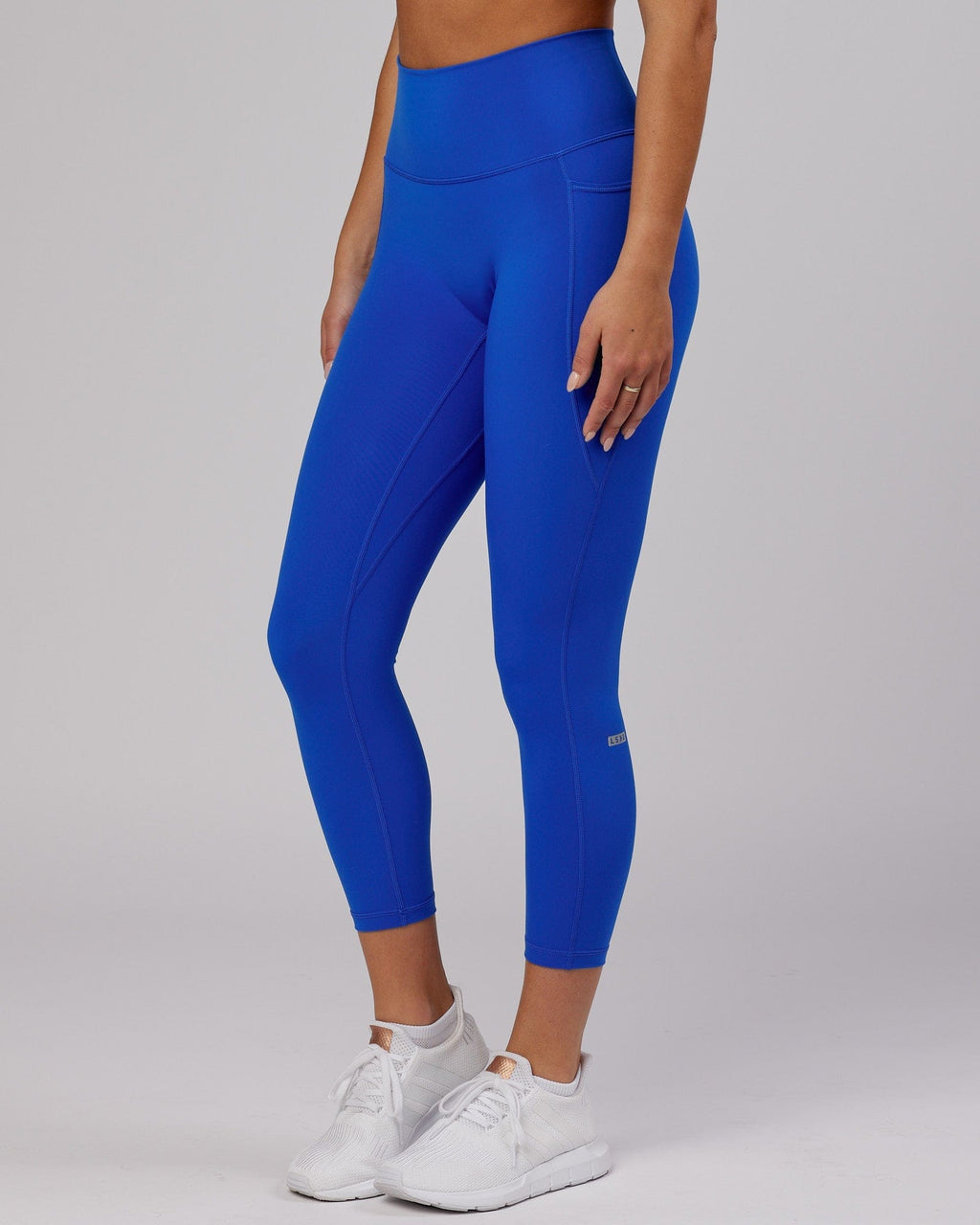 Model wearing Fusion 7/8 Length Tight - Strong Blue