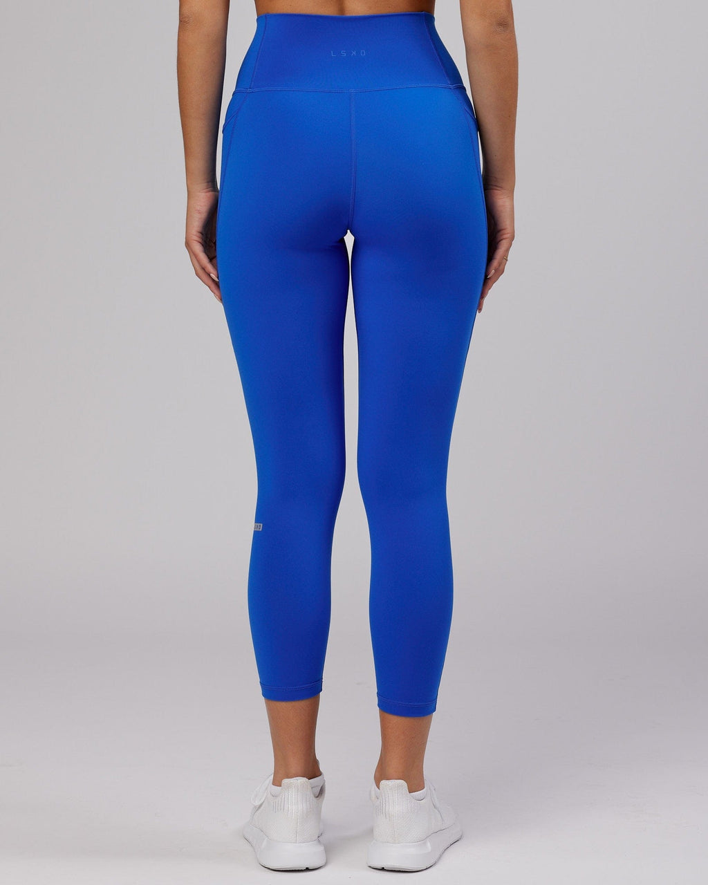 Model wearing Fusion 7/8 Length Tight - Strong Blue