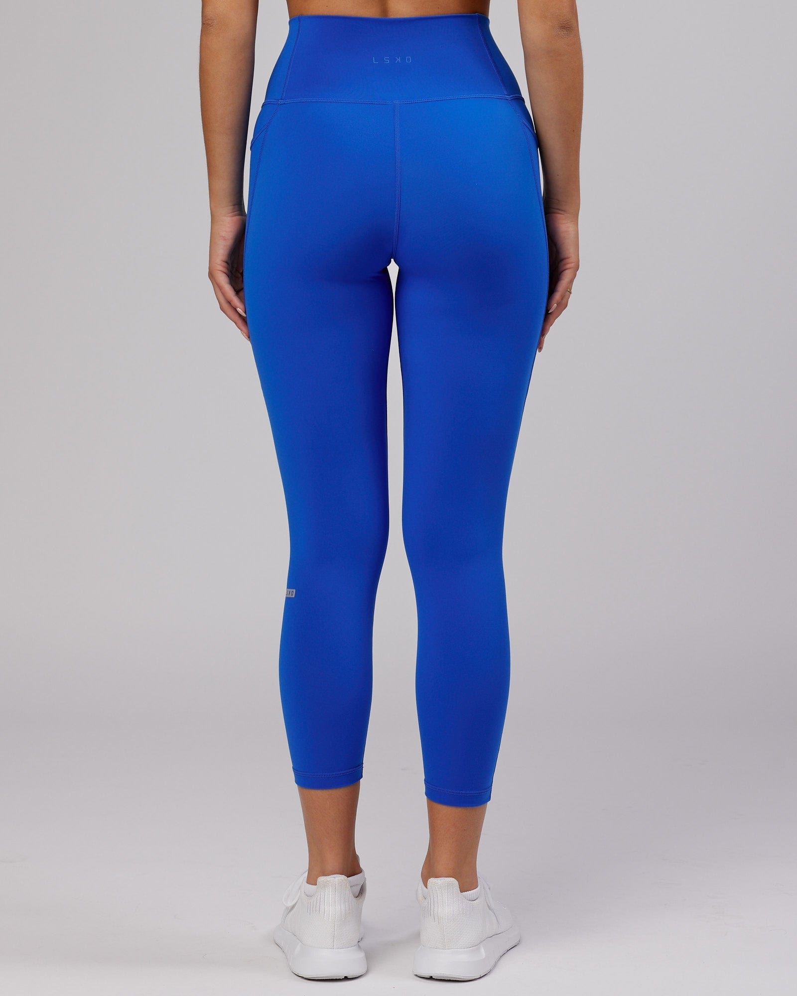 Model wearing Fusion 7/8 Length Tight - Strong Blue
