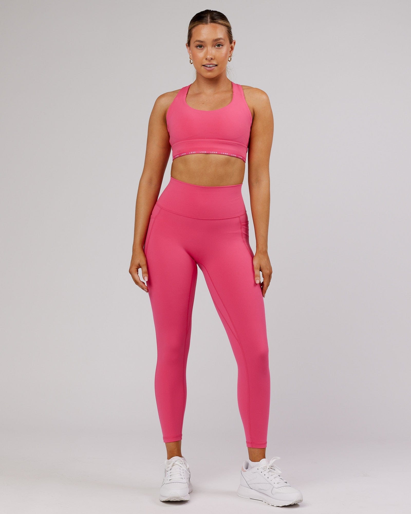 Model wearing Fusion 7/8 Length Tight - Flamingo