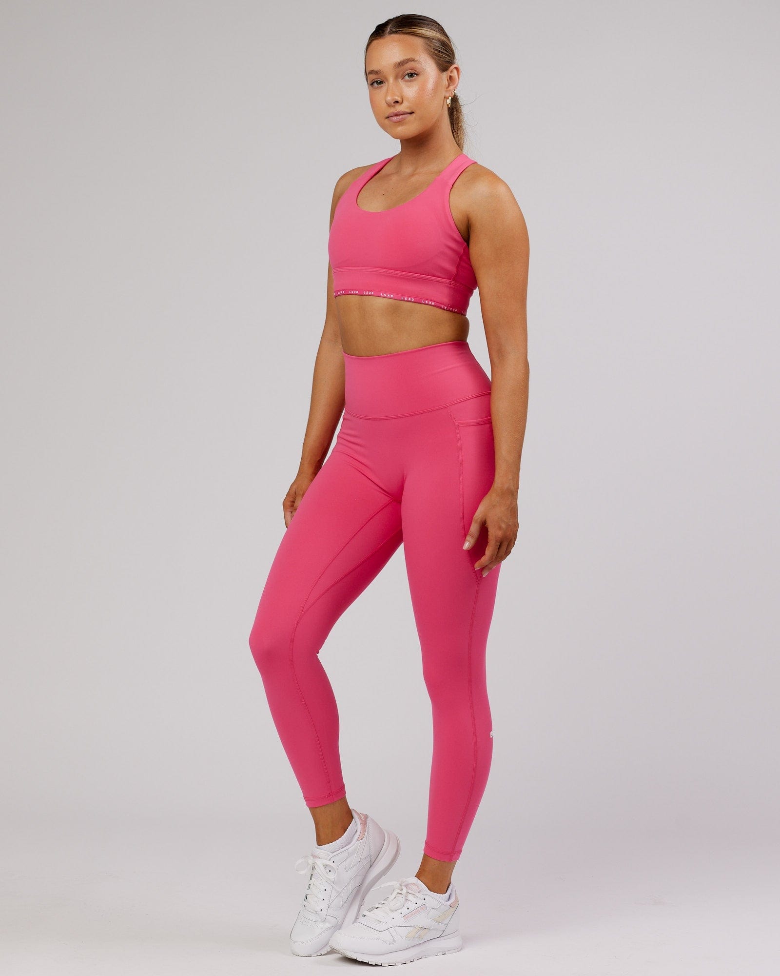 Model wearing Fusion 7/8 Length Tight - Flamingo