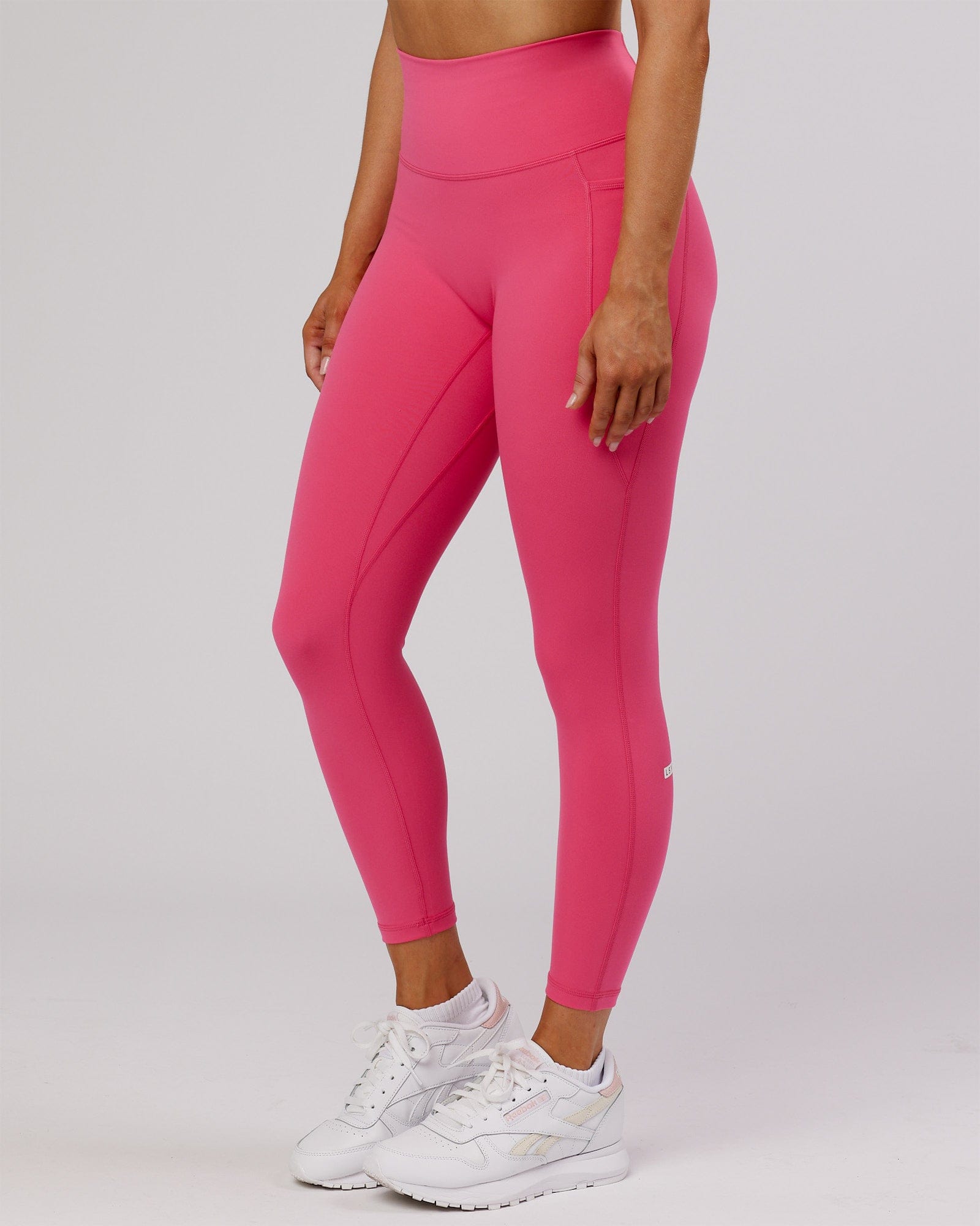 Model wearing Fusion 7/8 Length Tight - Flamingo