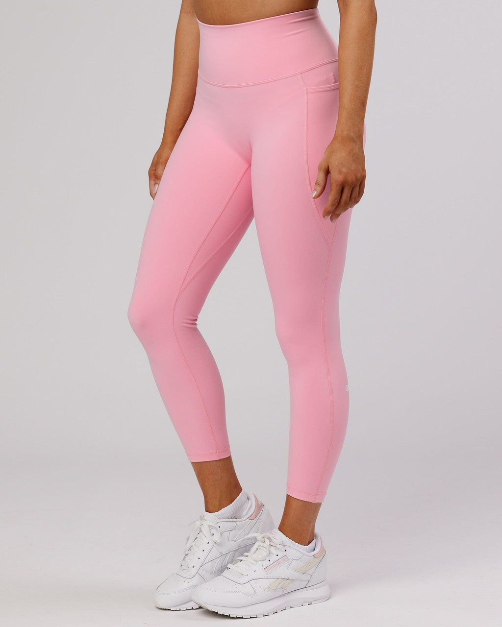 Model wearing Fusion 7/8 Length Tight - Pink Frosting