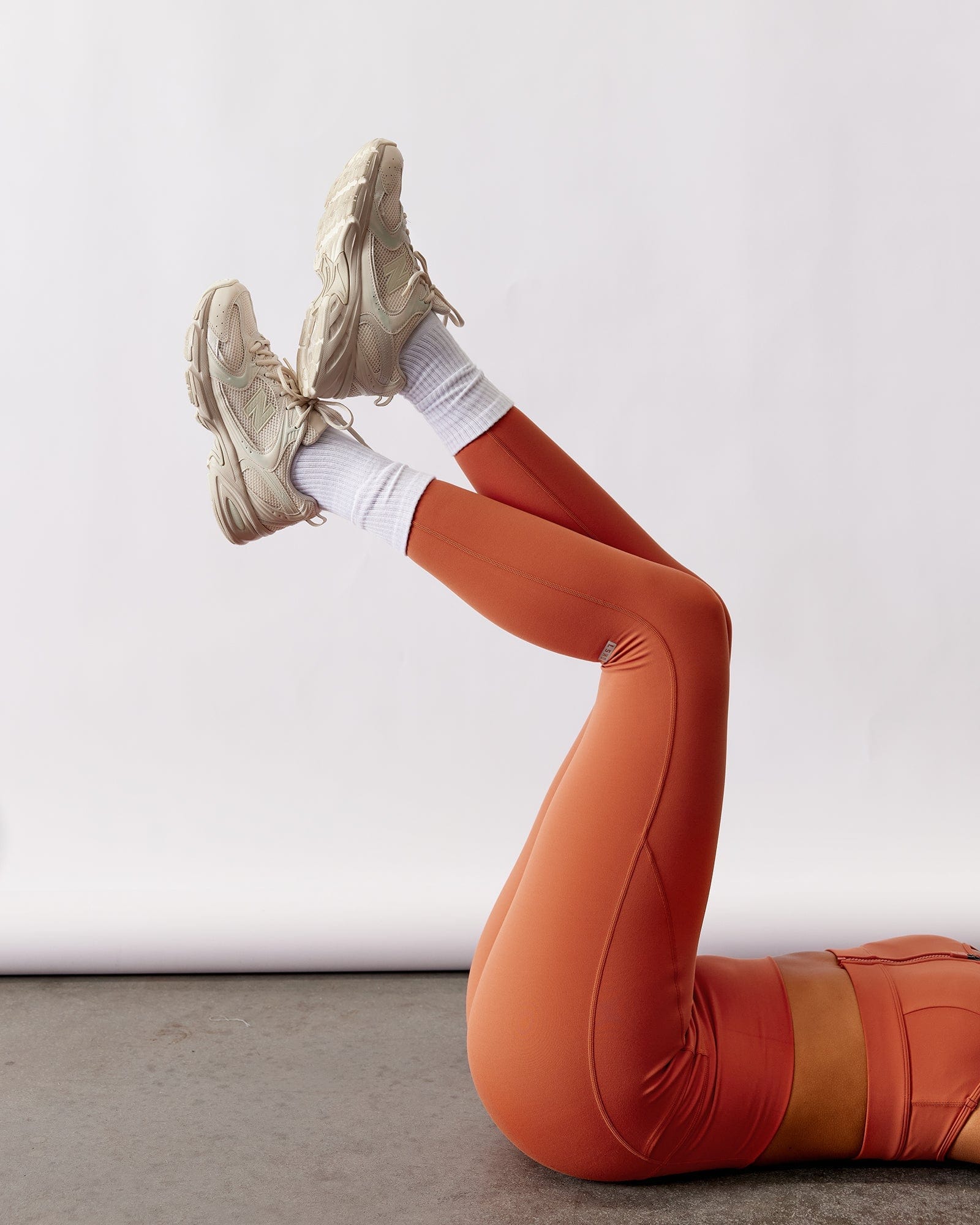 Model wearing Fusion Full Length Tight - Auburn