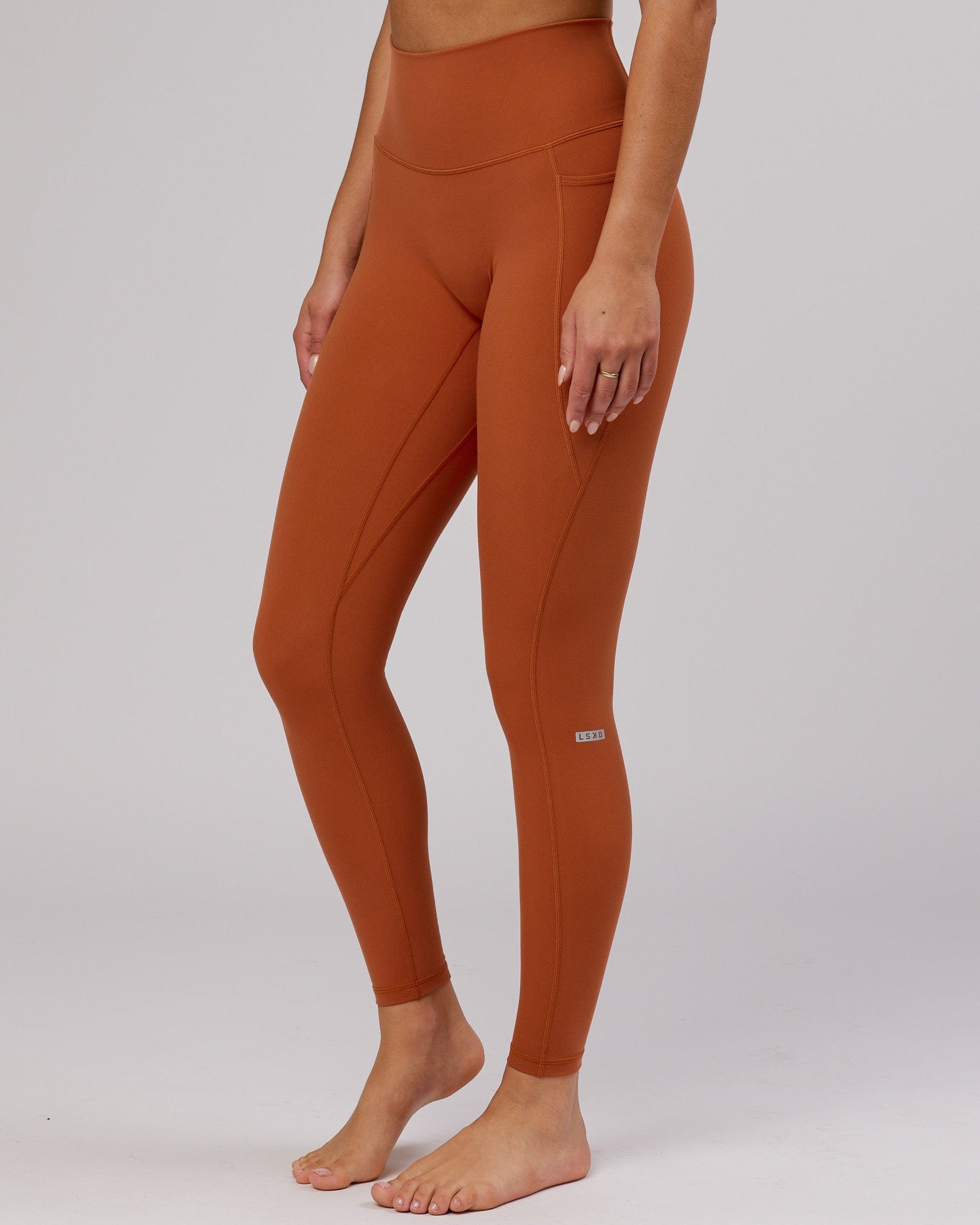 Model wearing Fusion Full Length Tight - Auburn