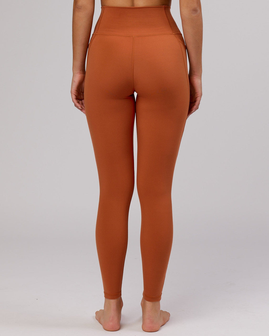Model wearing Fusion Full Length Tight - Auburn