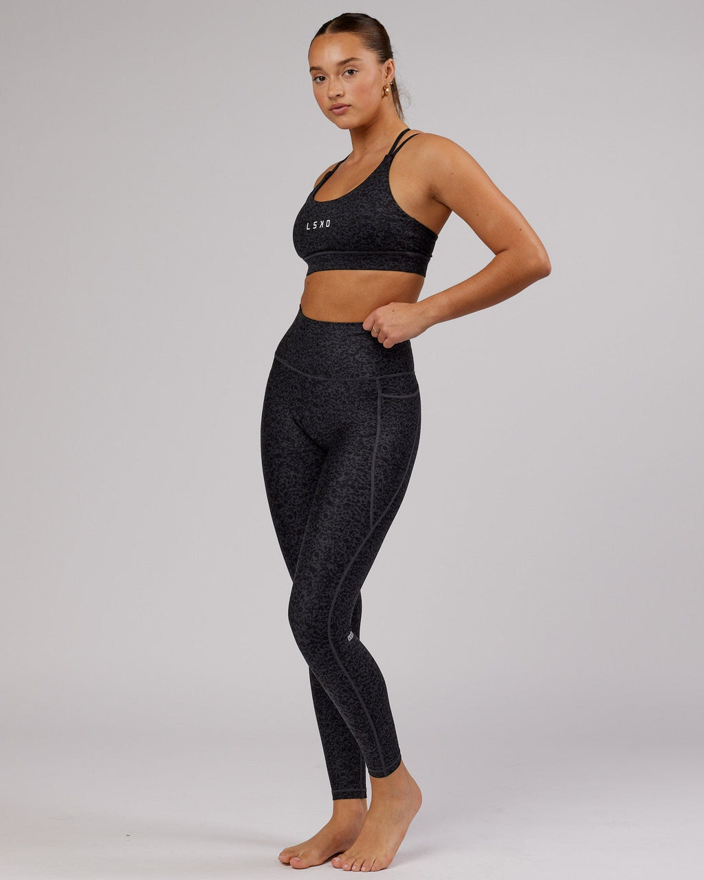 Model wearing Fusion Full Length Tight - Black Etching