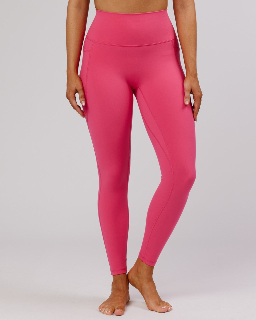 Model wearing Fusion Full Length Tight - Flamingo