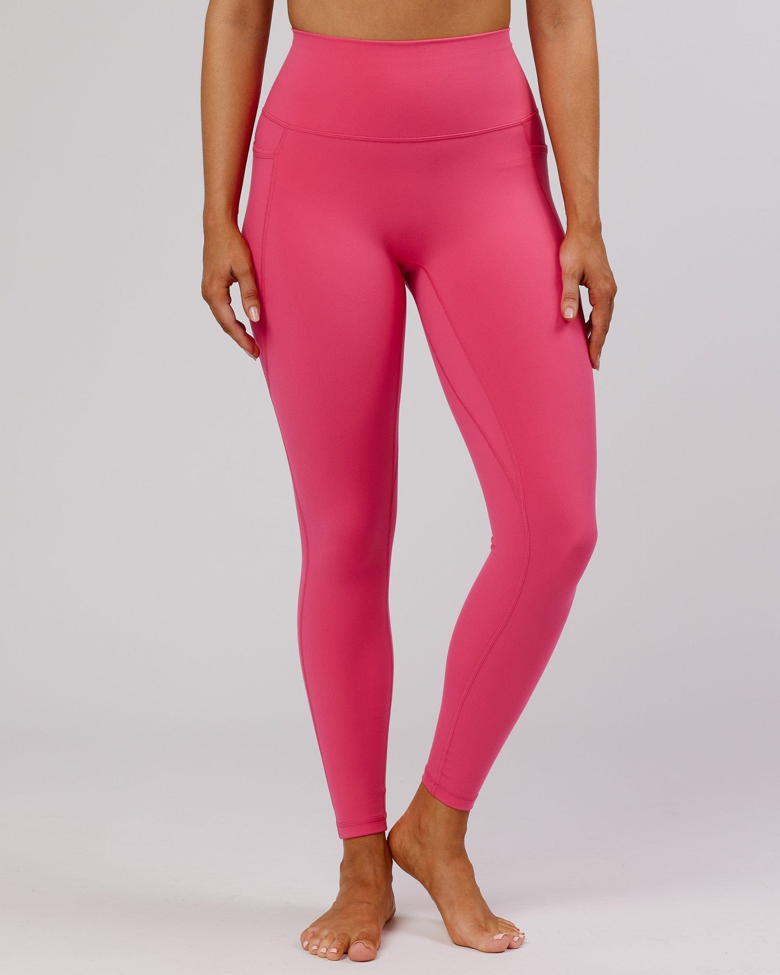 Model wearing Fusion Full Length Tight - Flamingo