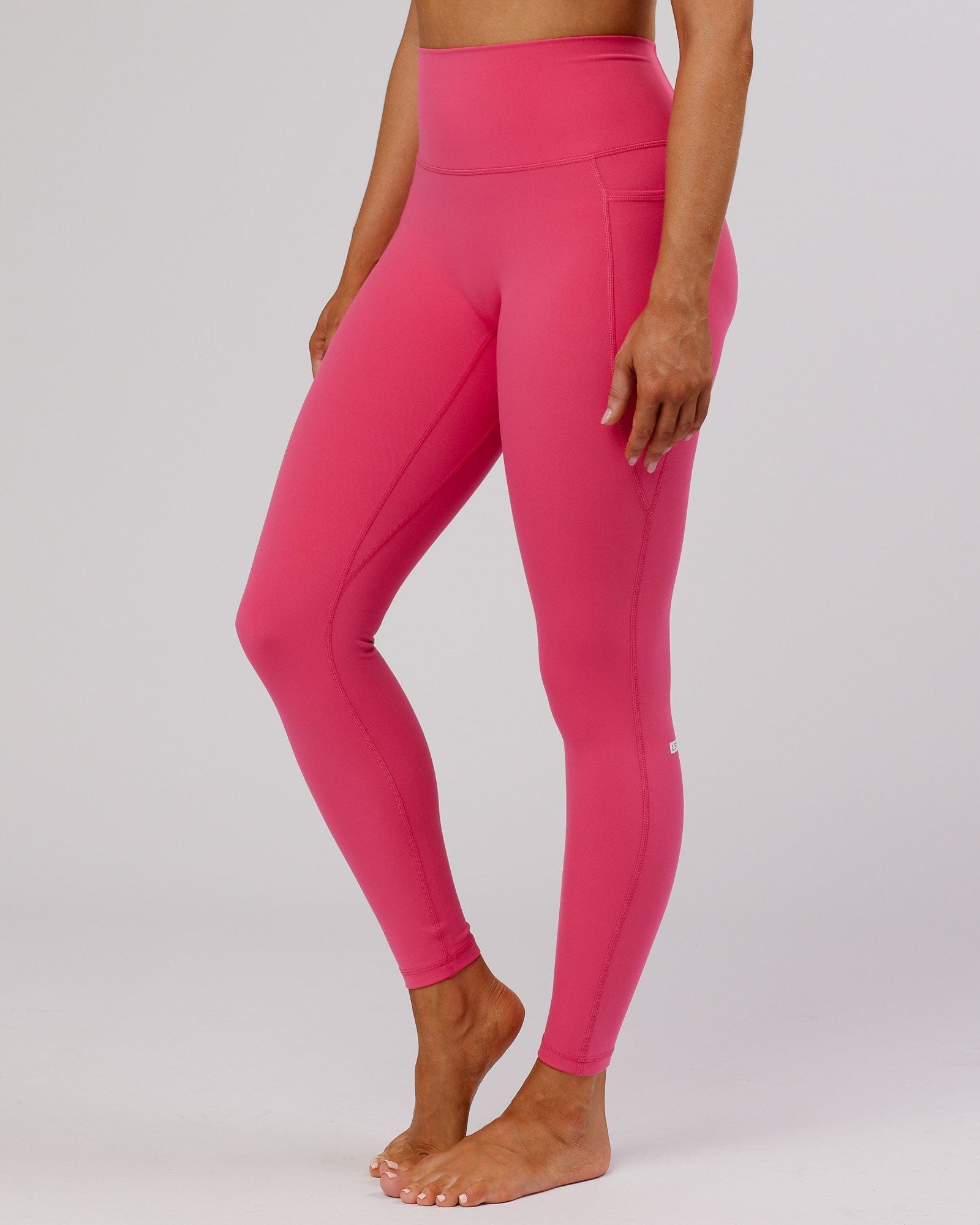 Model wearing Fusion Full Length Tight - Flamingo