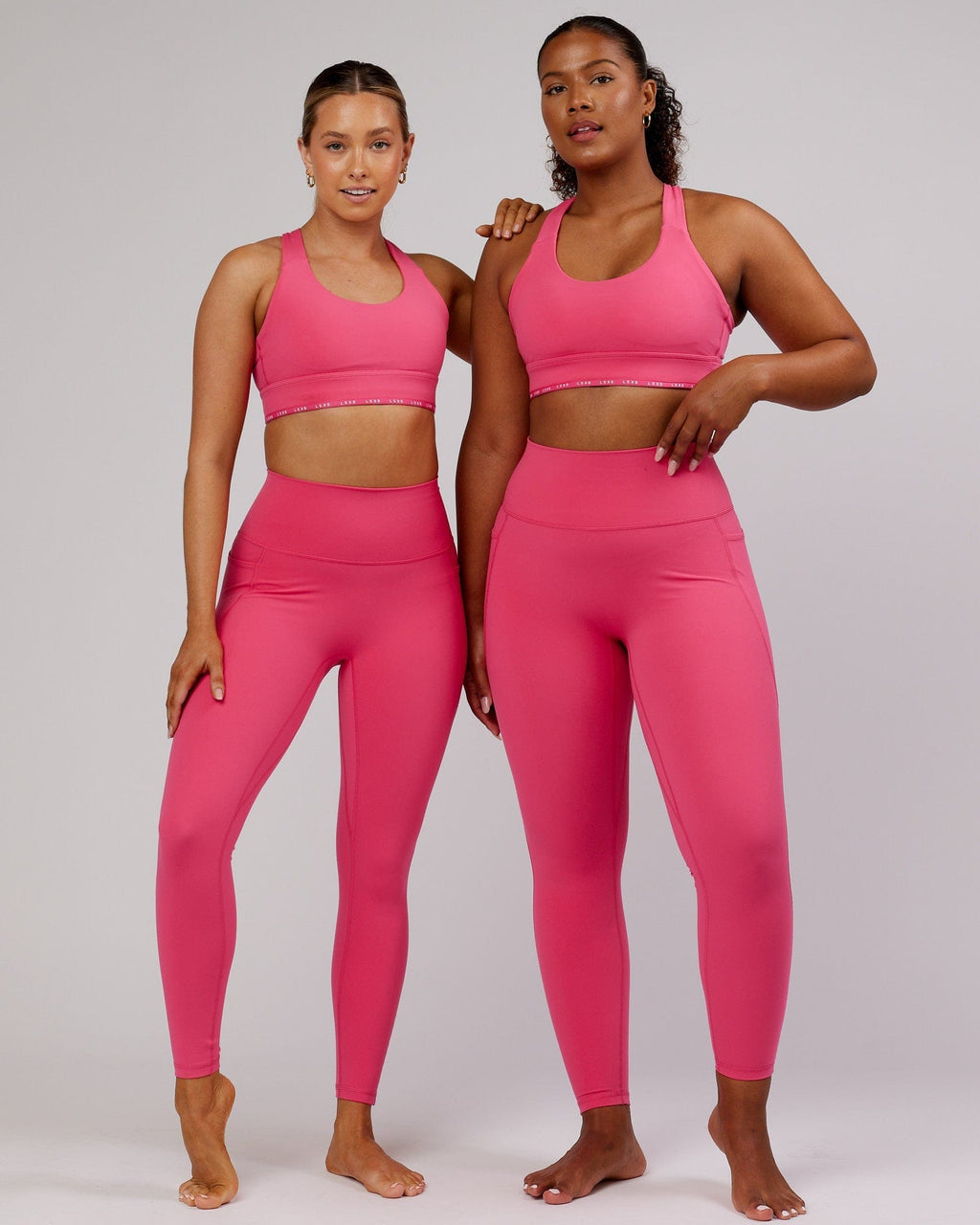 Model wearing Fusion Full Length Tight - Flamingo