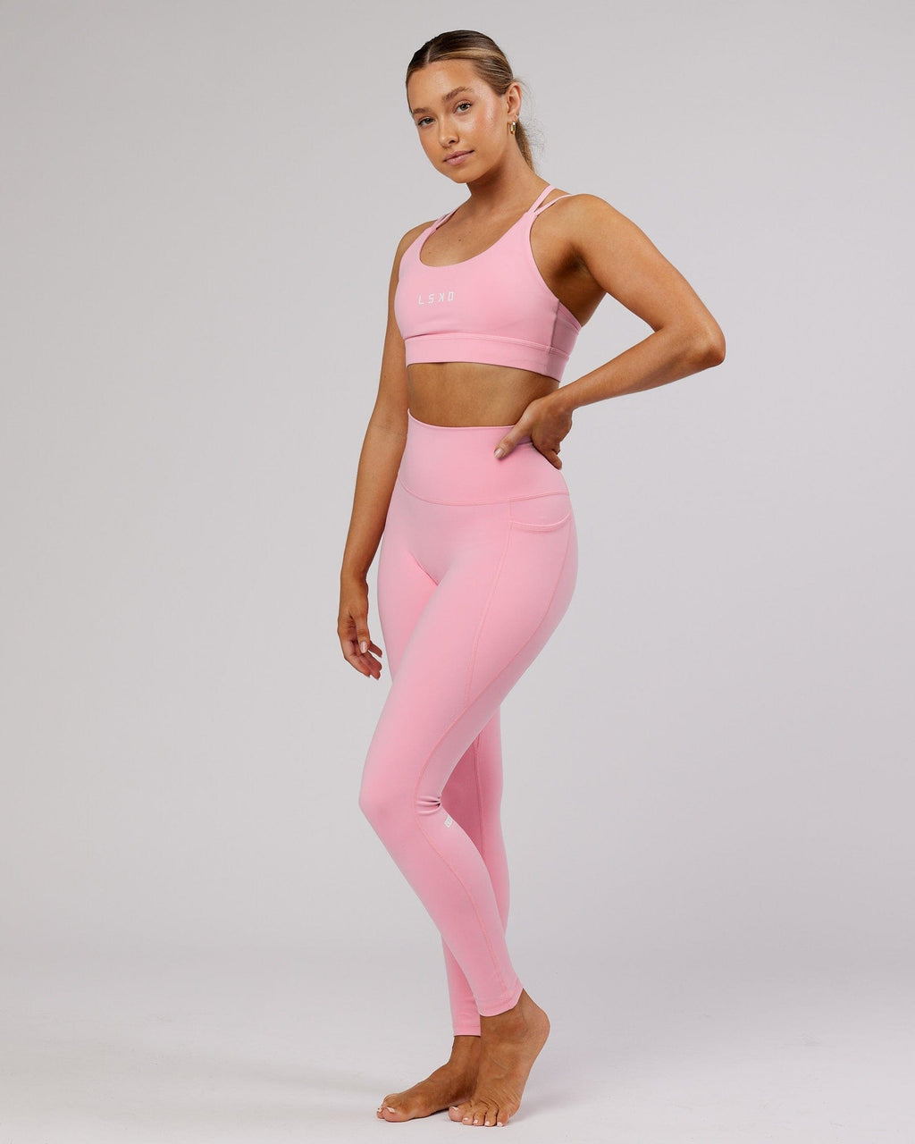 Model wearing Fusion Full Length Tight - Pink Frosting