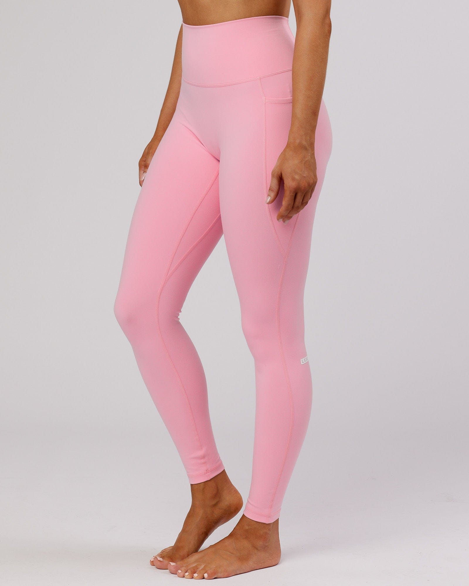 Model wearing Fusion Full Length Tight - Pink Frosting